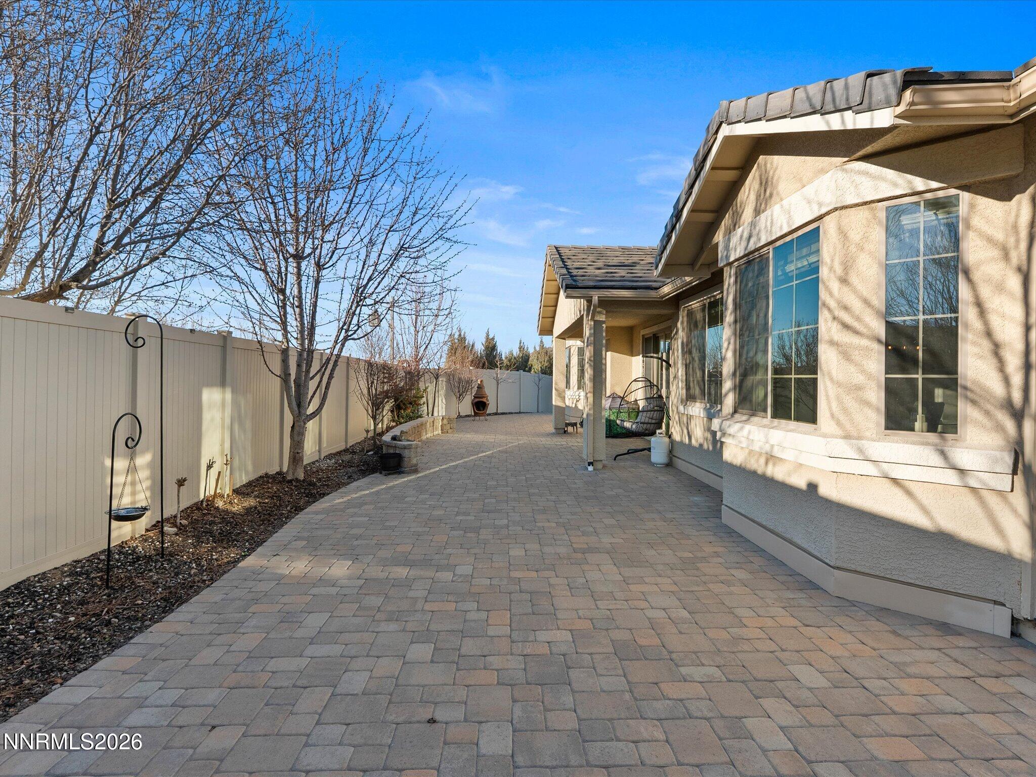 9803 Ash Meadow Drive Reno, NV 89521 - Photo 41 of 56 a view of a house with a yard