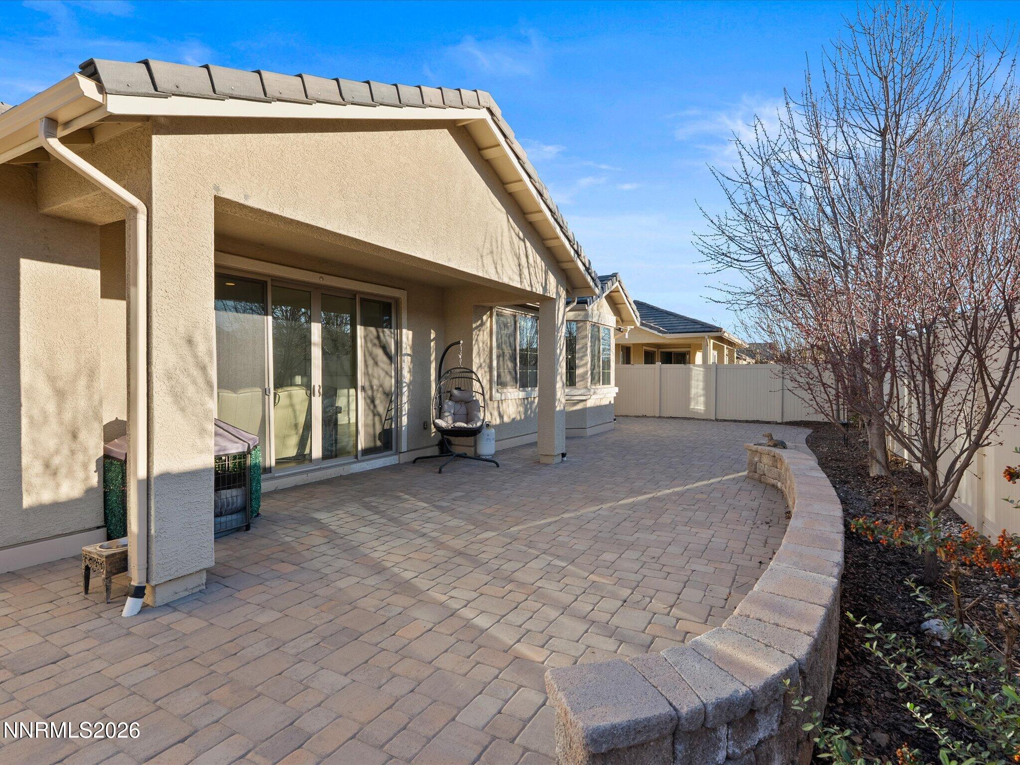 9803 Ash Meadow Drive Reno, NV 89521 - Photo 42 of 56 a view of a house with a outdoor space