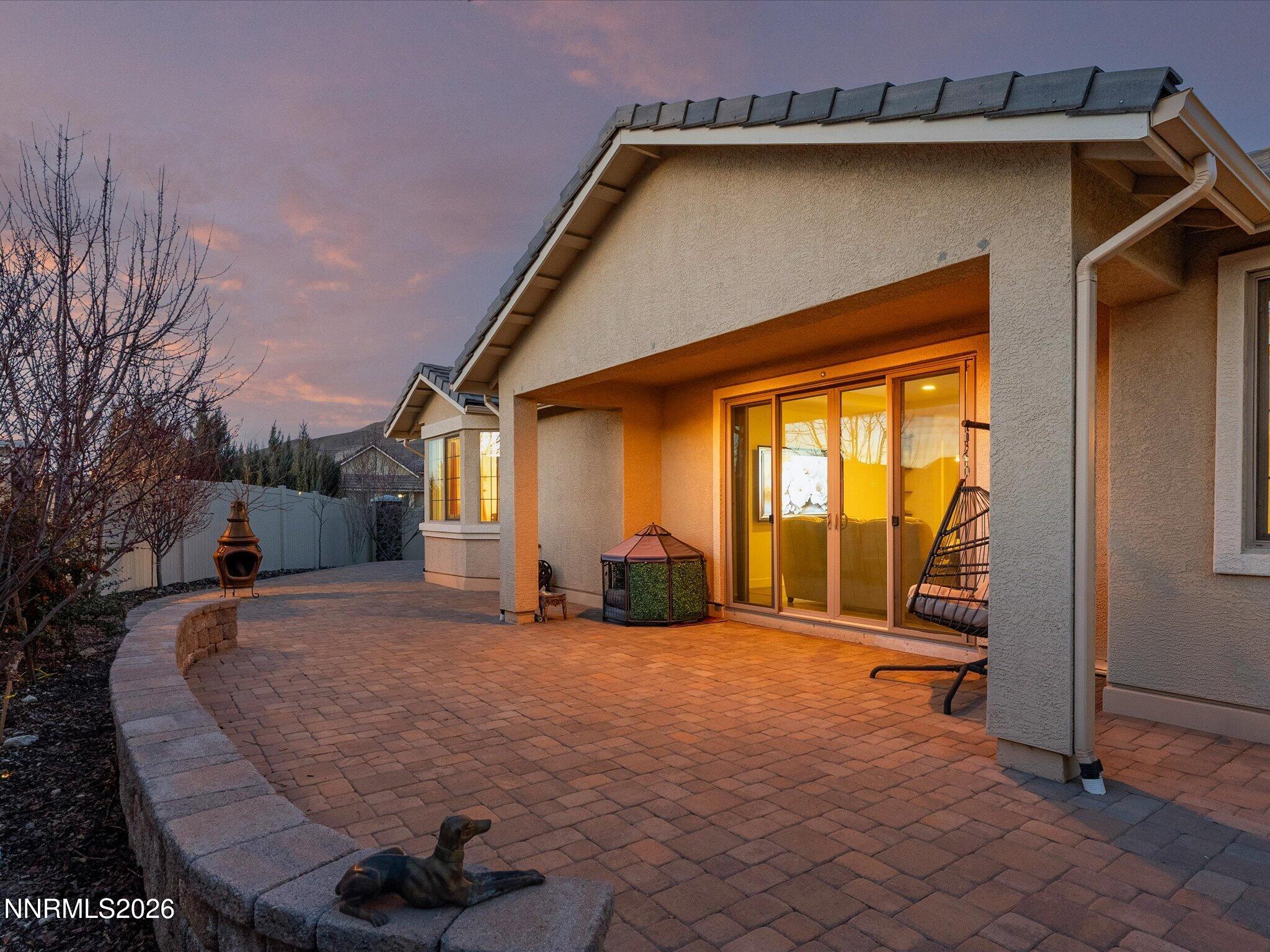 9803 Ash Meadow Drive Reno, NV 89521 - Photo 51 of 56 a view of a house with backyard and porch