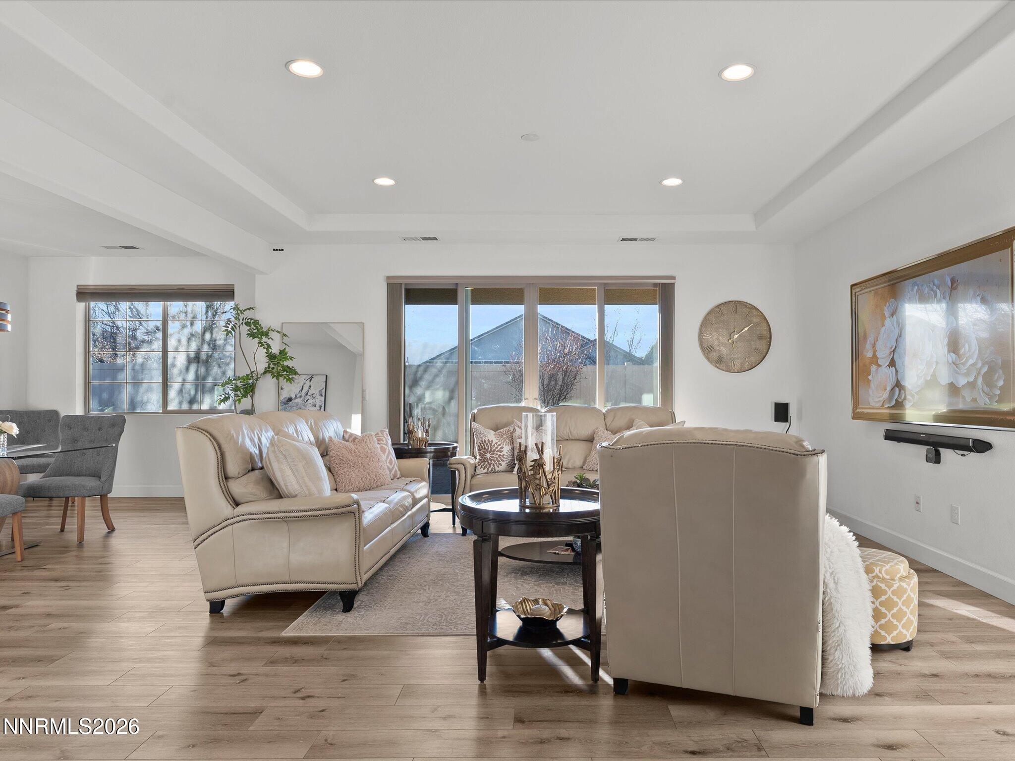 9803 Ash Meadow Drive Reno, NV 89521 - Photo 8 of 56 a living room with furniture and a large window