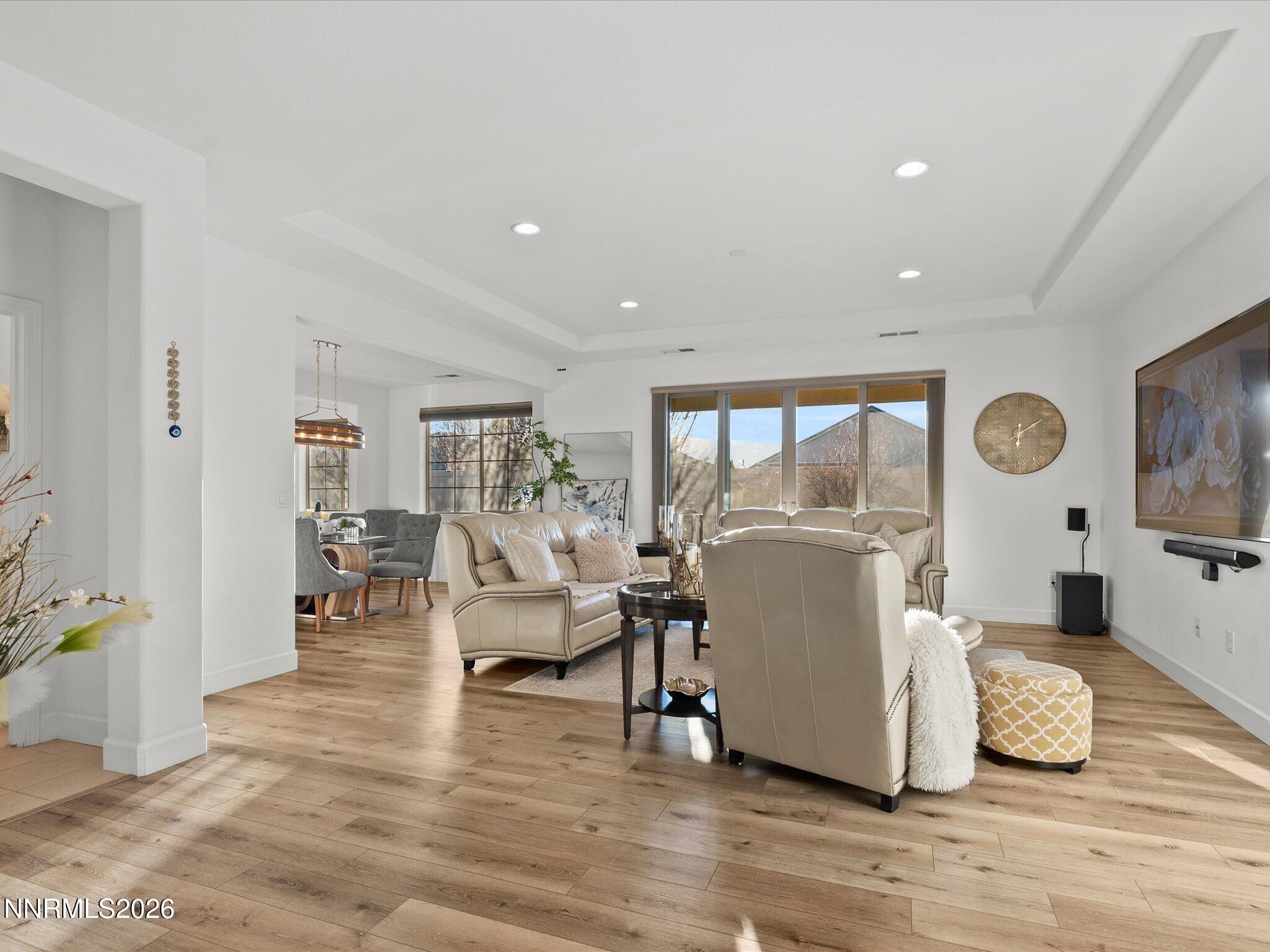 9803 Ash Meadow Drive Reno, NV 89521 - Photo 9 of 56 a living room with furniture and a large window