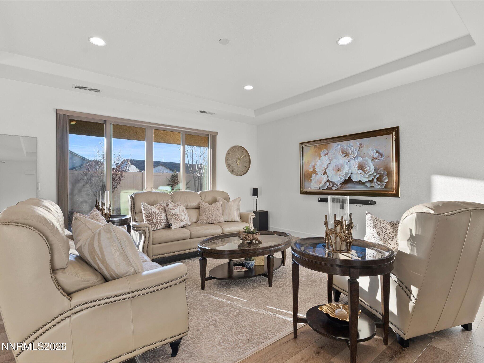 9803 Ash Meadow Drive Reno, NV 89521 - Photo 10 of 56 a living room with furniture and a large window
