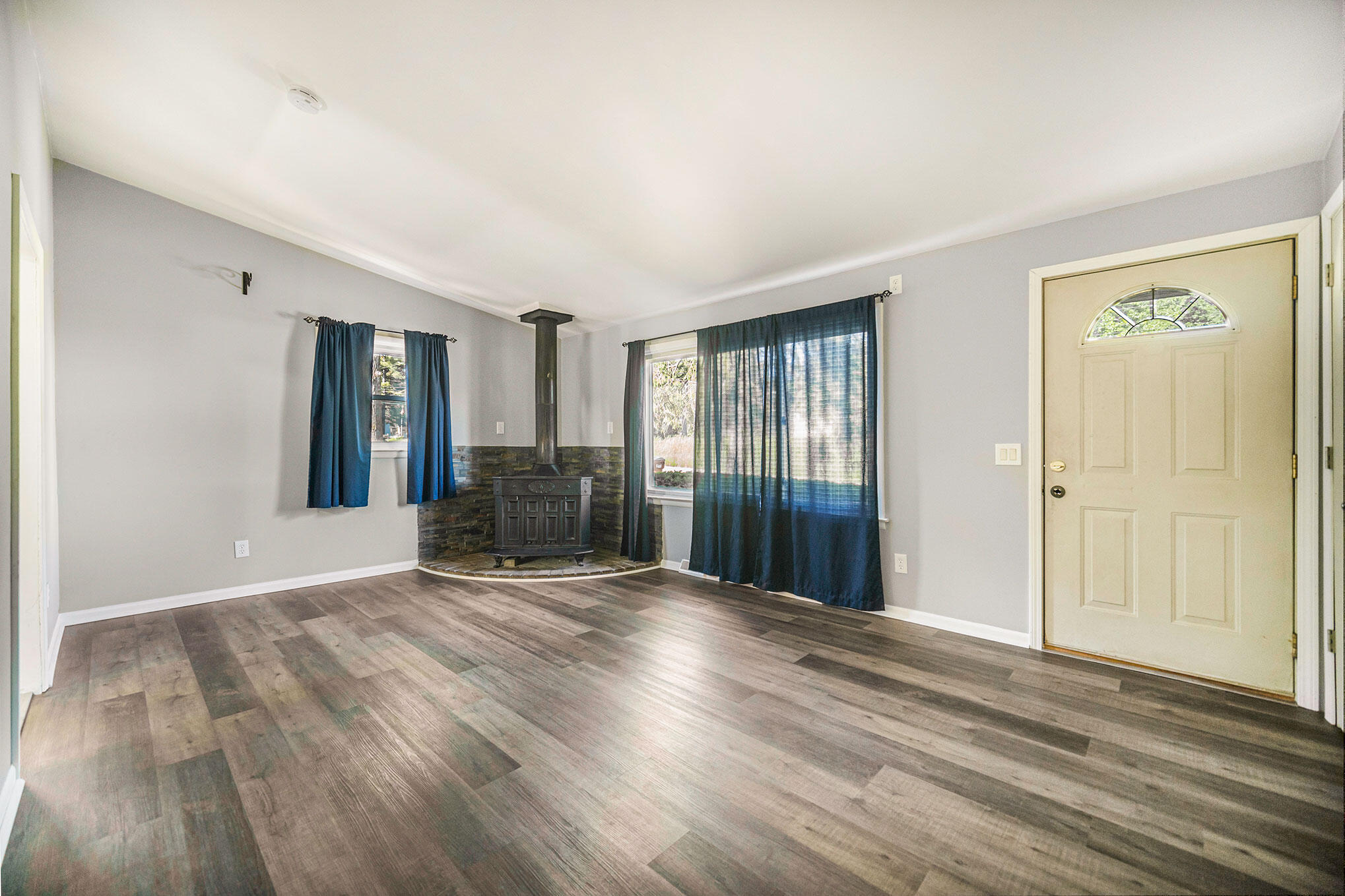 214 Teft Road Spring Arbor, MI 49283 - Photo 2 of 27 Living Room with wood burner