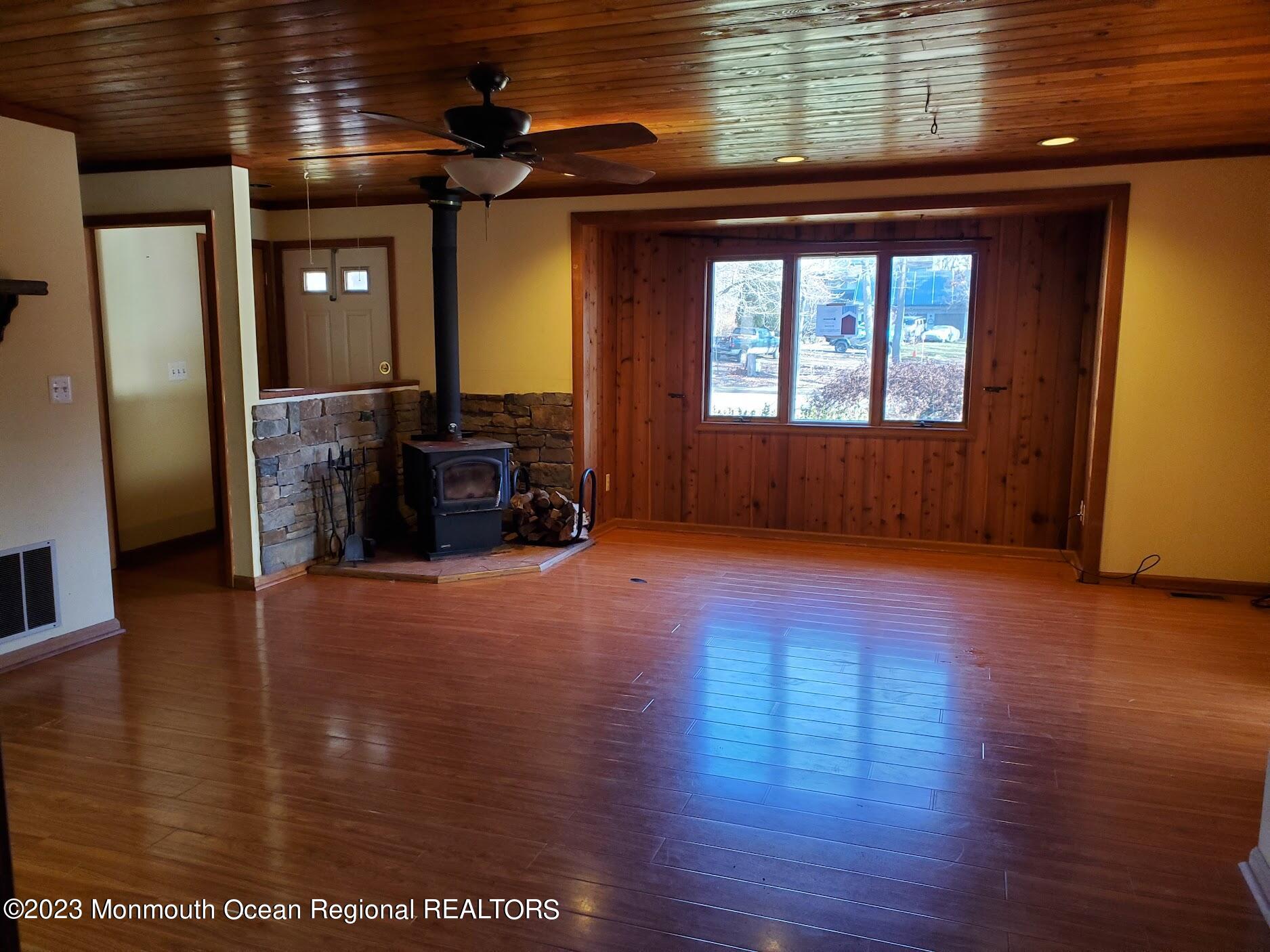 16 Pinewood Road Howell, NJ 07731 - Photo 12 of 28 a view of livingroom with furniture and wooden floor