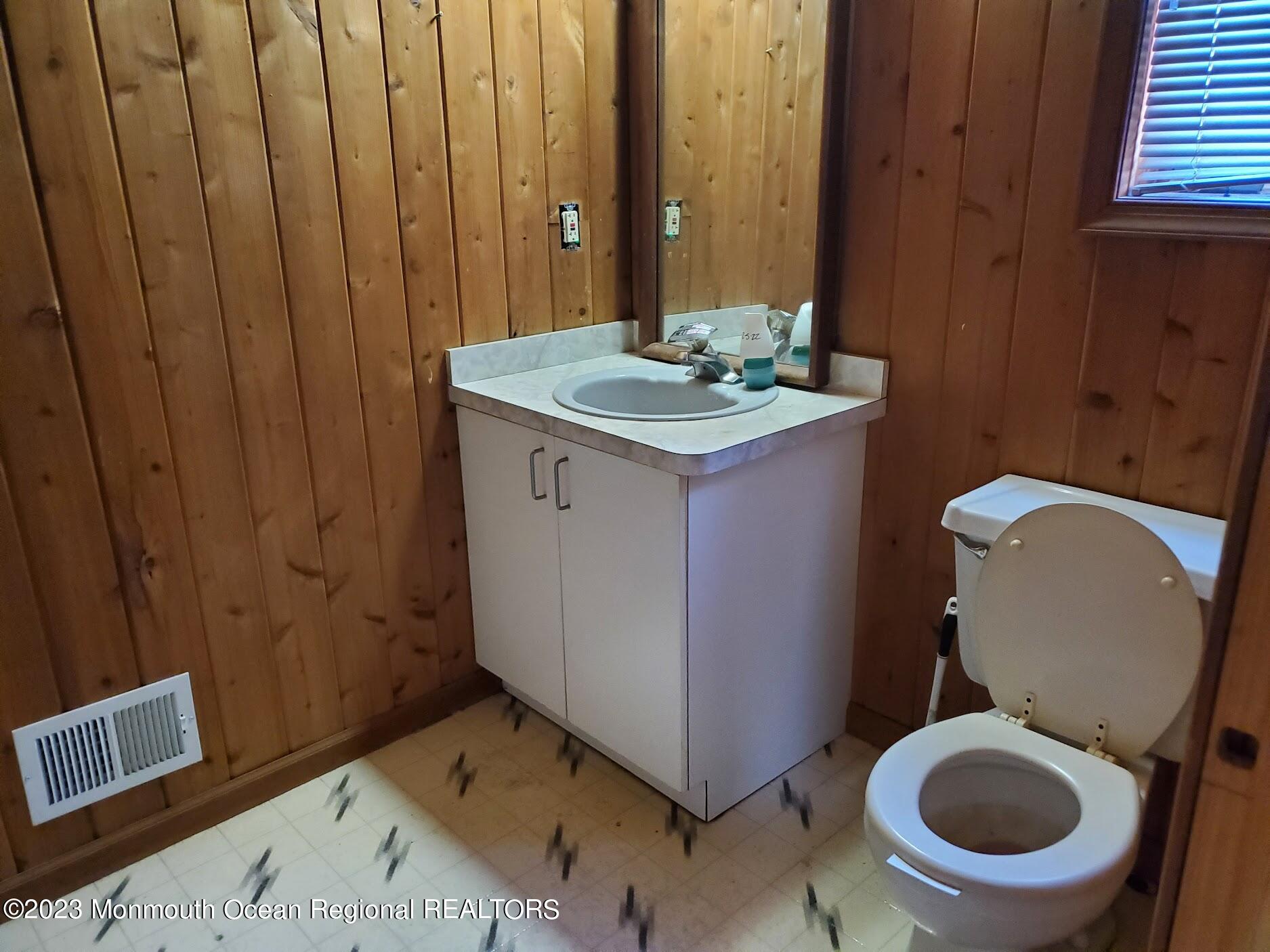16 Pinewood Road Howell, NJ 07731 - Photo 16 of 28 a bathroom with a sink and a toilet