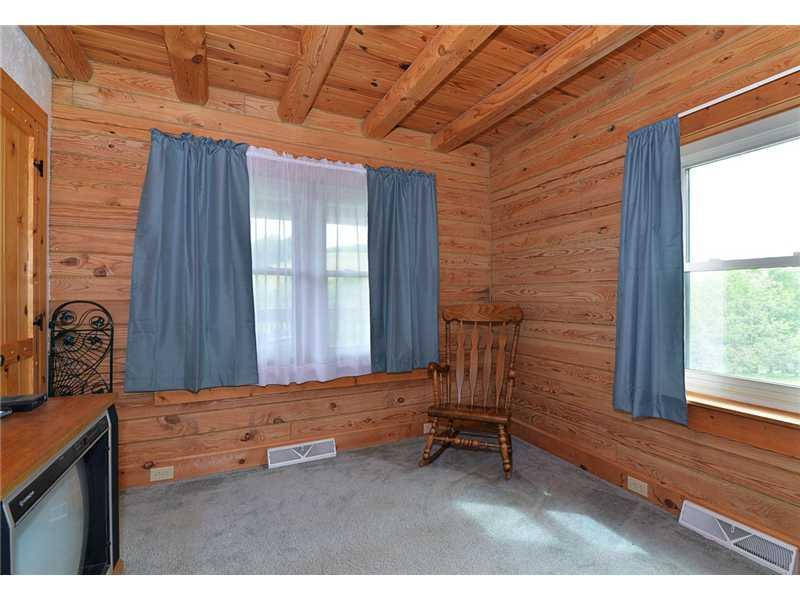 285 Taffy Run Road Rochester, PA 15074 - Photo 8 of 22 Den/Family/Great Room. 4th Bedroom on Main floor now used as office. Full, Jack-Jill Bathroom adjoins and also adjoins hallway.
