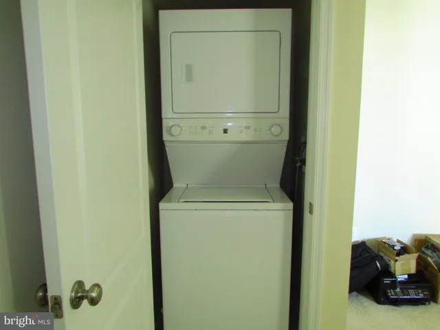 a view of a kitchen with a sink and a stove