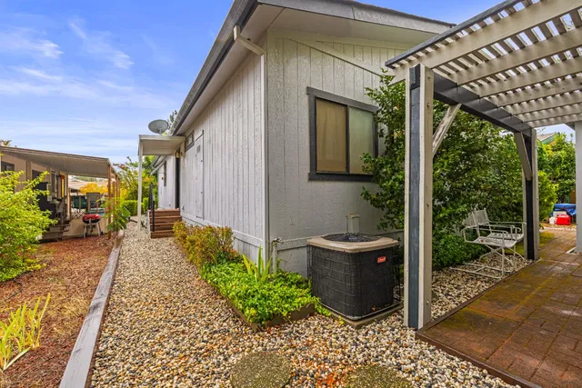 a view of entryway with wooden floor and stairs