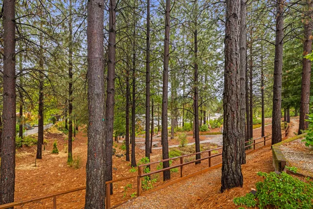a view of a swimming pool with sitting area
