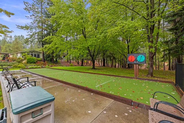 a view of swimming pool with a garden
