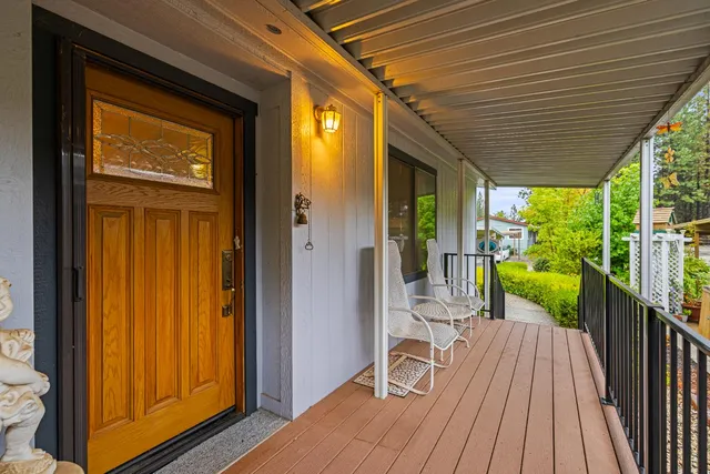 a view of balcony with furniture