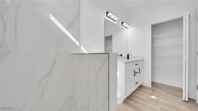 a view of room that has a walk in closet