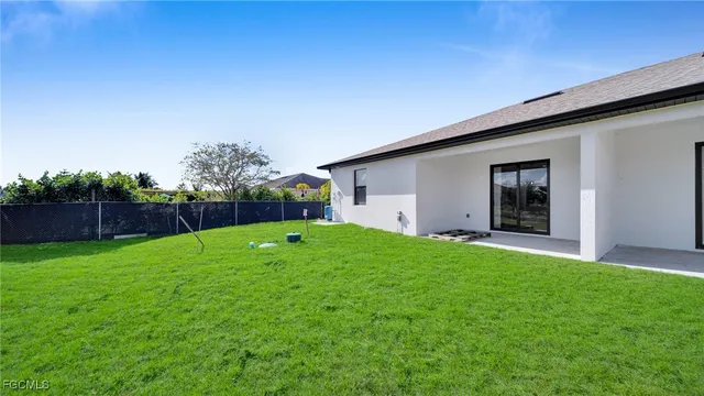 an aerial view of a house with garden
