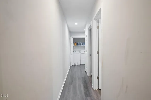 a kitchen with granite countertop a stove top oven