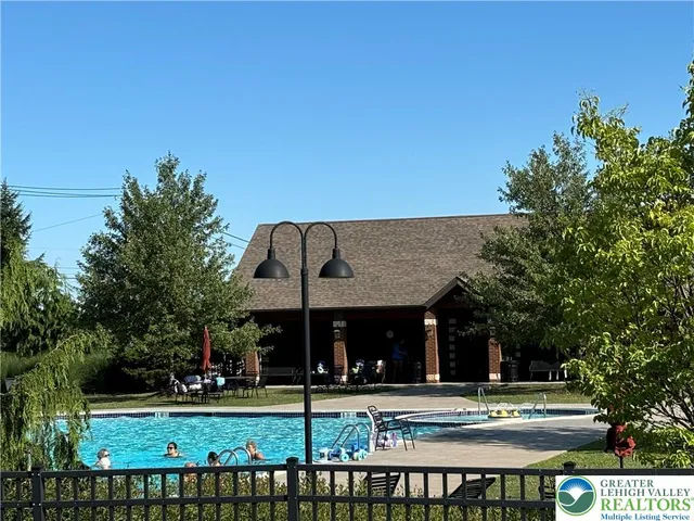 a front view of a building with garden