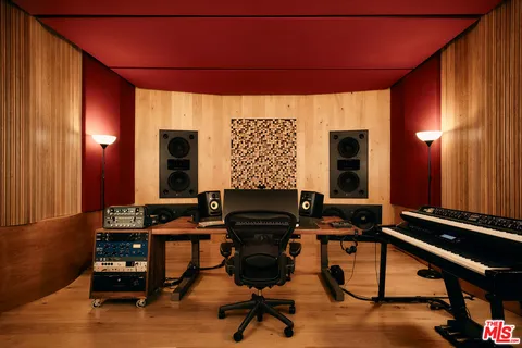 a room with furniture and wooden floor