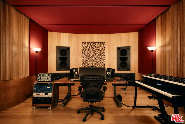 a room with furniture and wooden floor