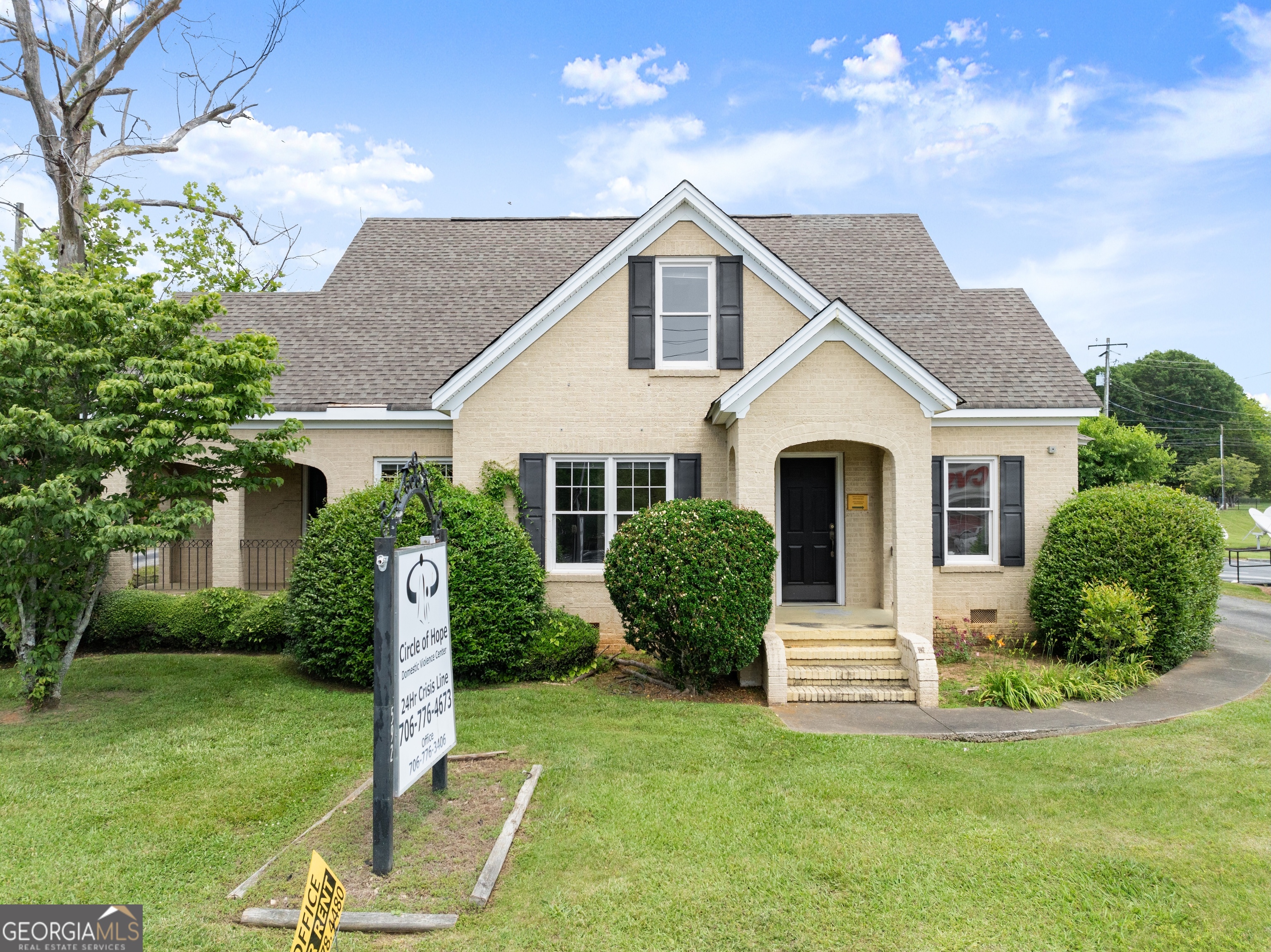 592 North Main Street Cornelia, GA 30531 - Photo 1 of 41 a front view of house with a garden