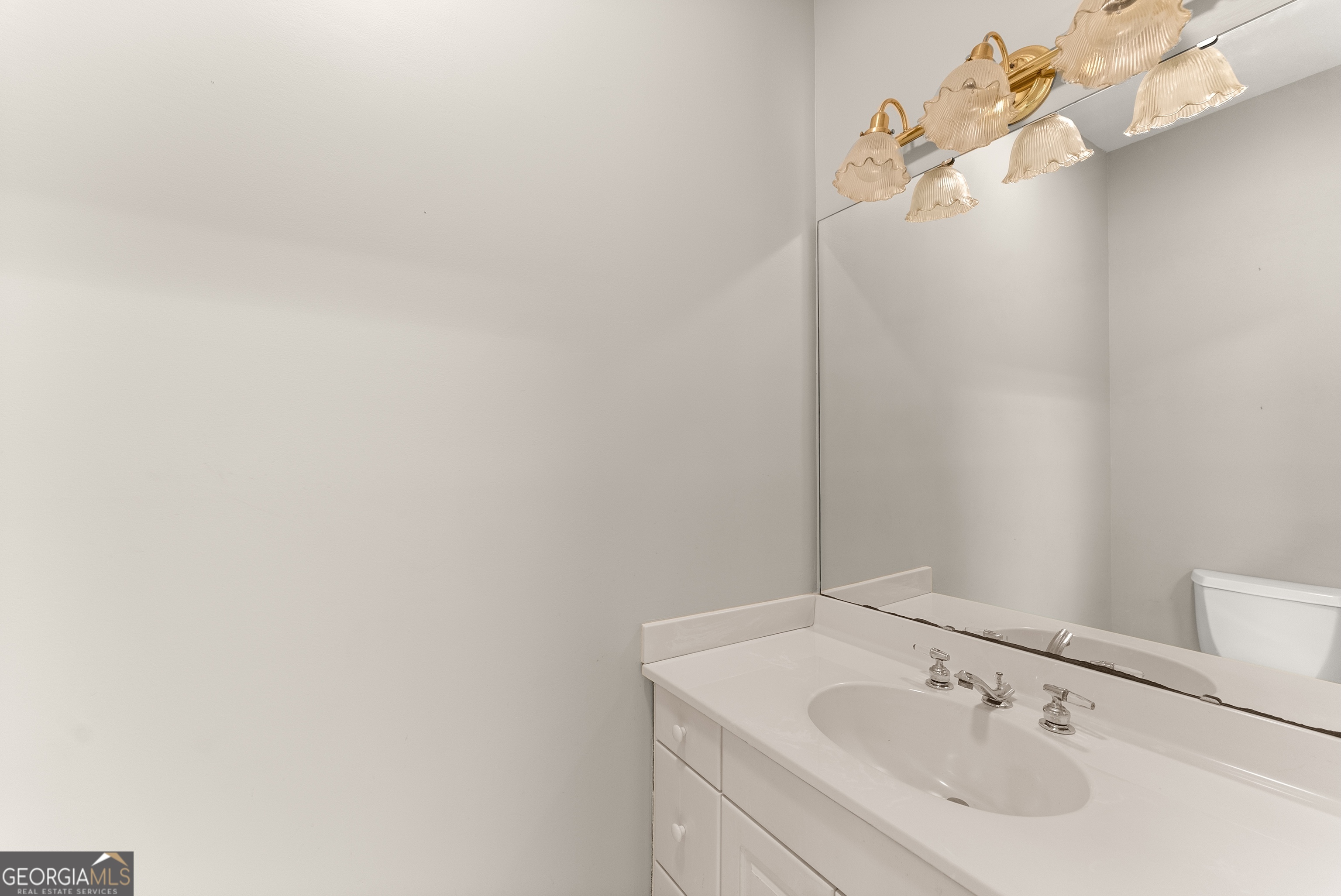 592 North Main Street Cornelia, GA 30531 - Photo 23 of 41 a bathroom with a sink and mirror