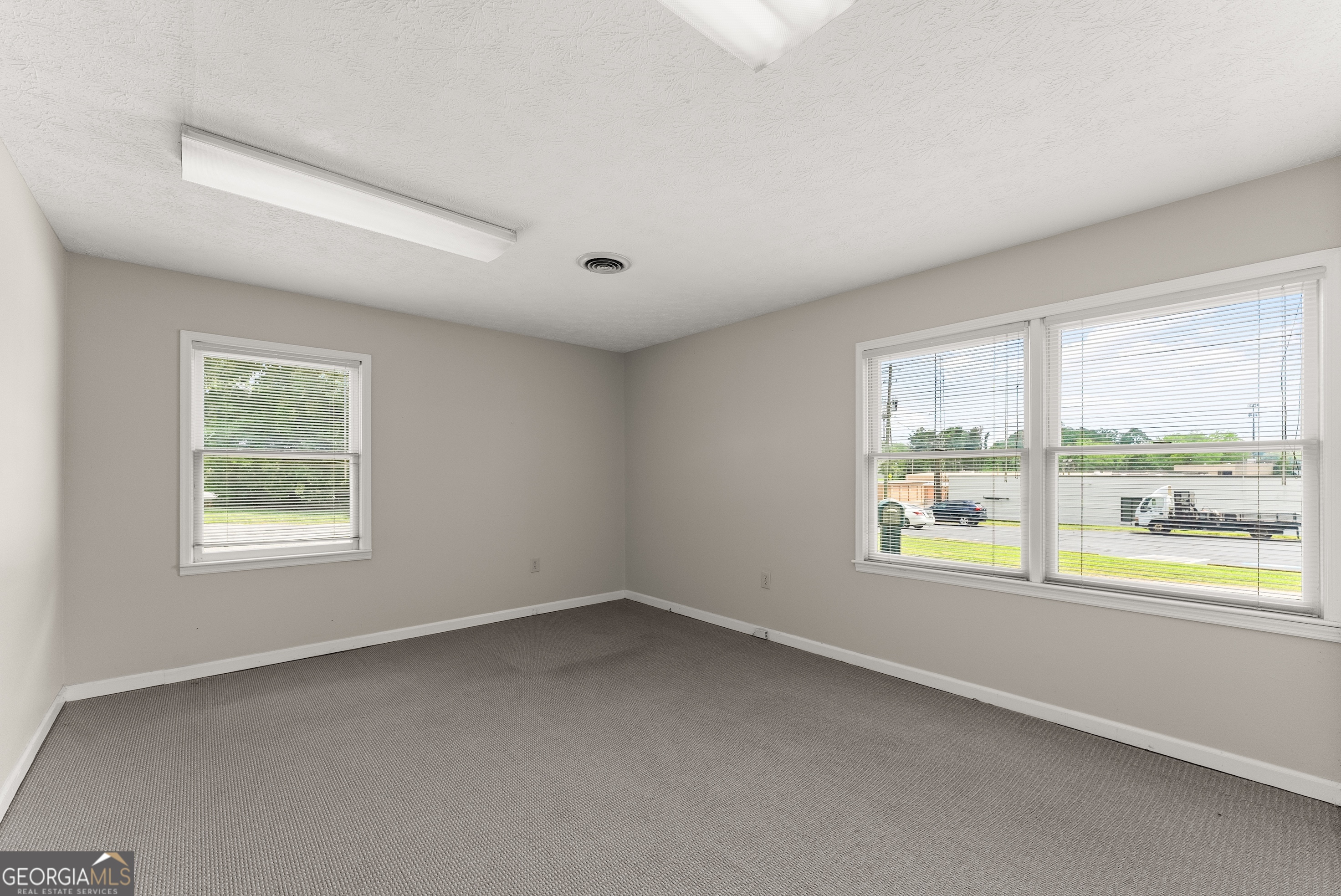 592 North Main Street Cornelia, GA 30531 - Photo 25 of 41 an empty room with a window