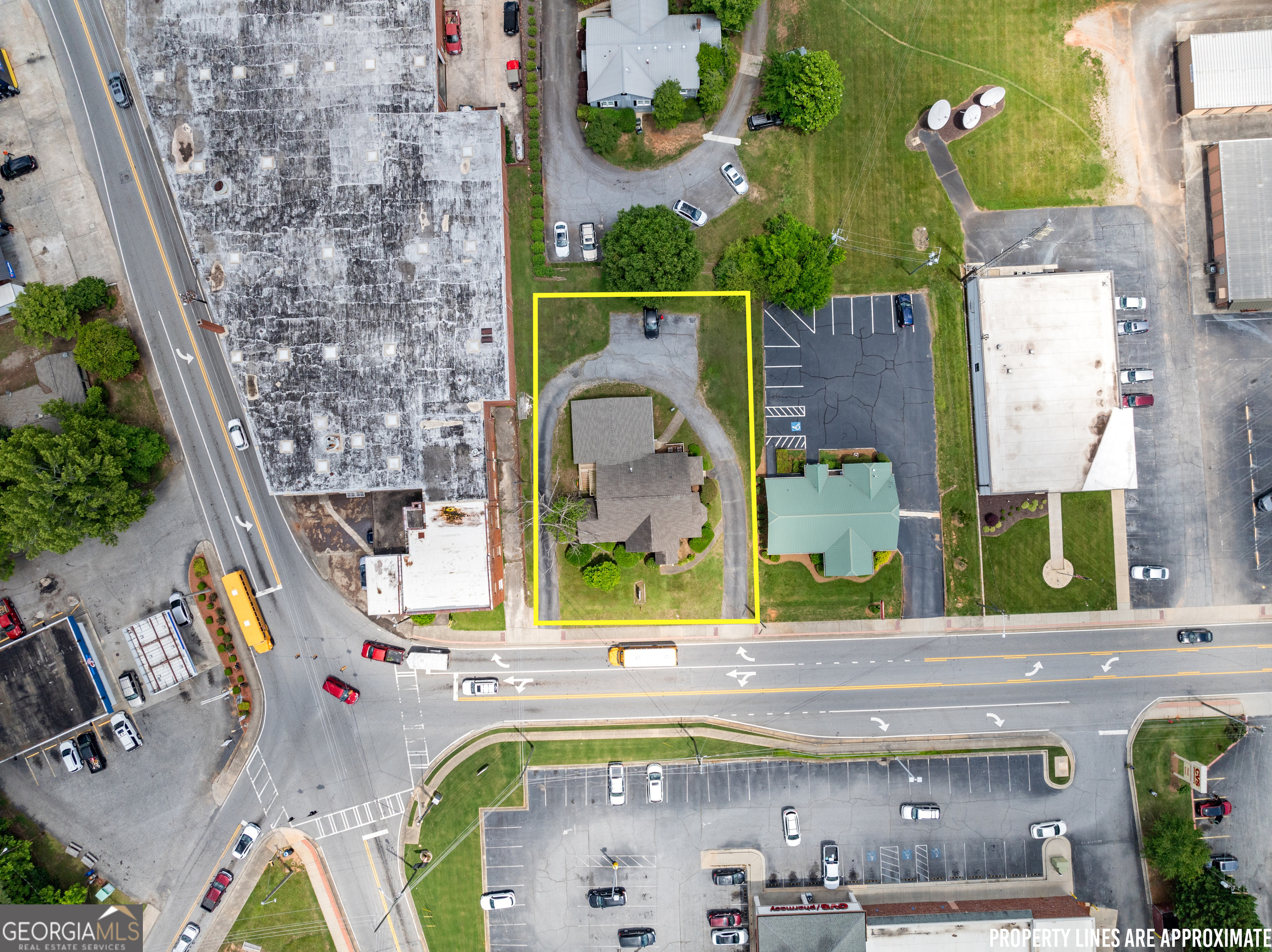 592 North Main Street Cornelia, GA 30531 - Photo 41 of 41 an aerial view of a house with a swimming pool