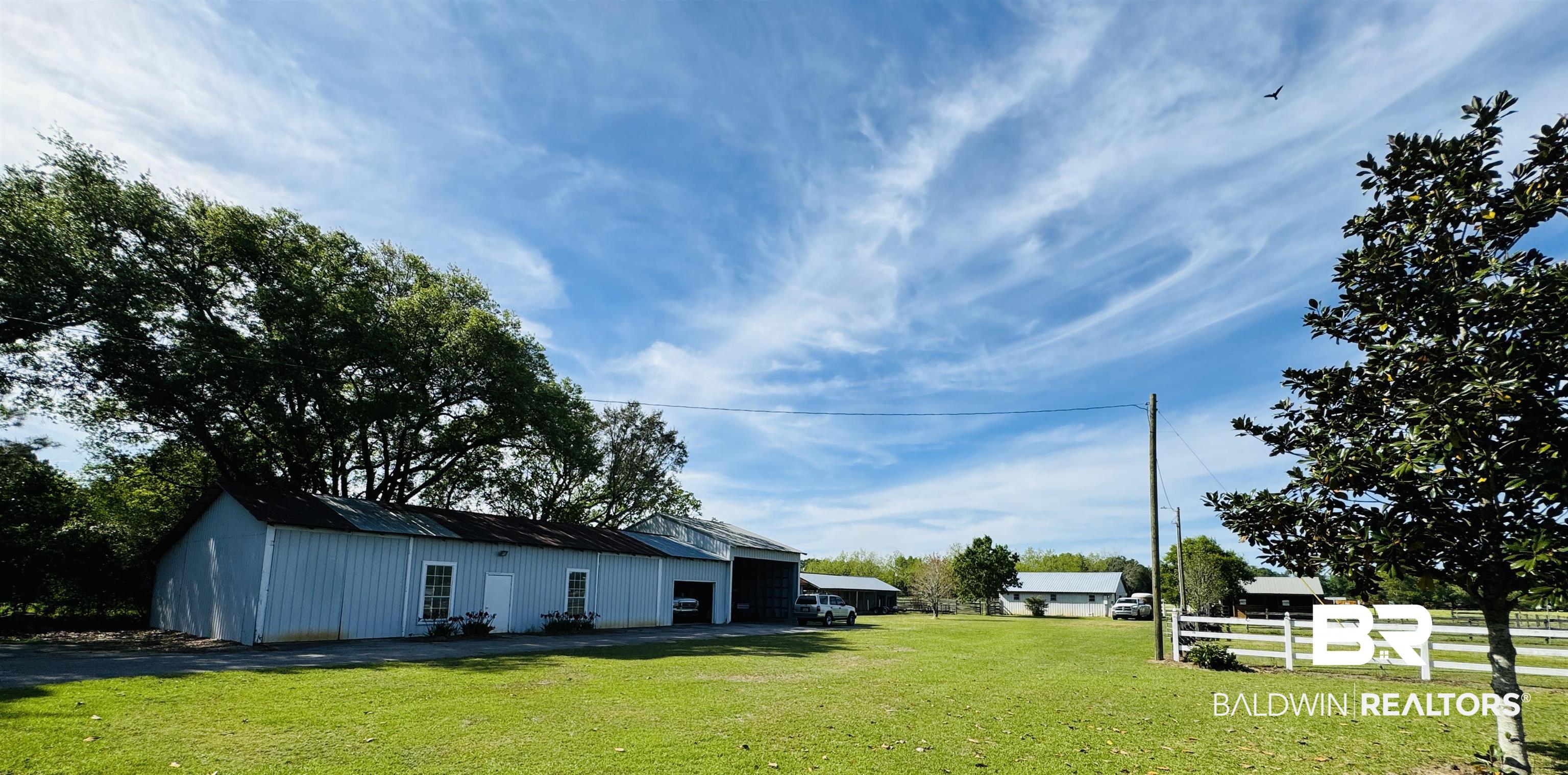 13795 White Road Silverhill, AL 36576 - Photo 76 of 99 View of yard with an outbuilding and a pole building