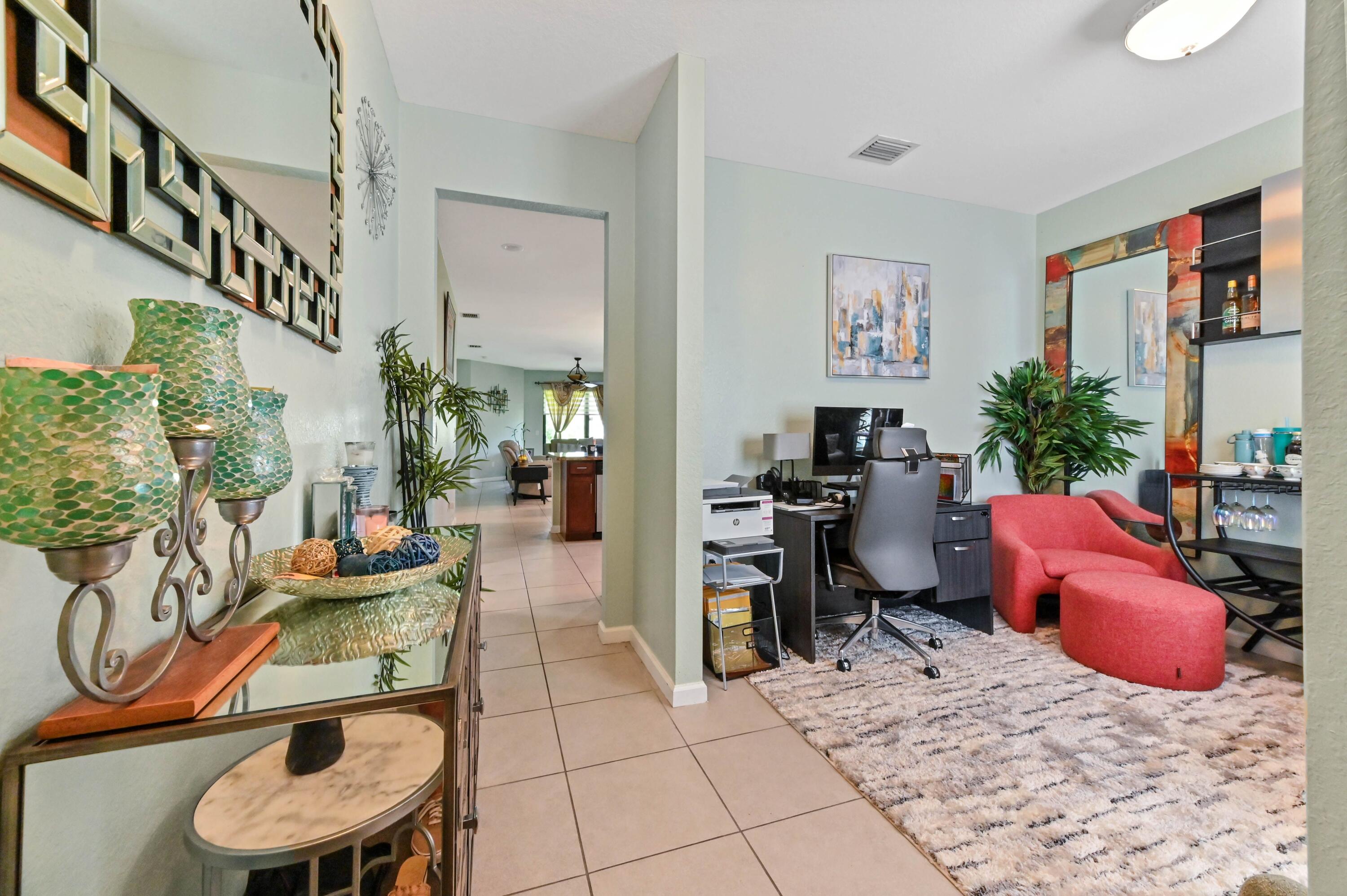 4848 Pond Pine Way Greenacres, FL 33463 - Photo 2 of 14 a room with musical instruments