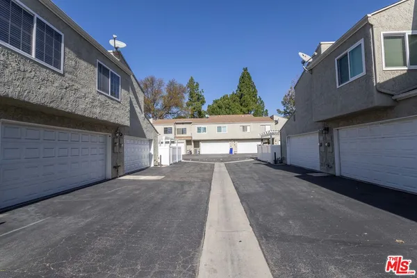 a view of a house with a large space