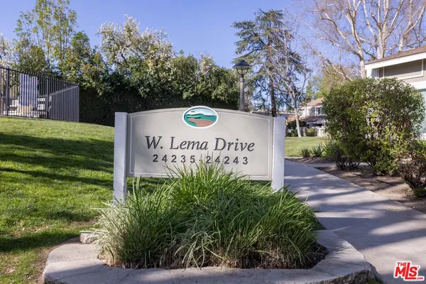 a sign on the side of the road