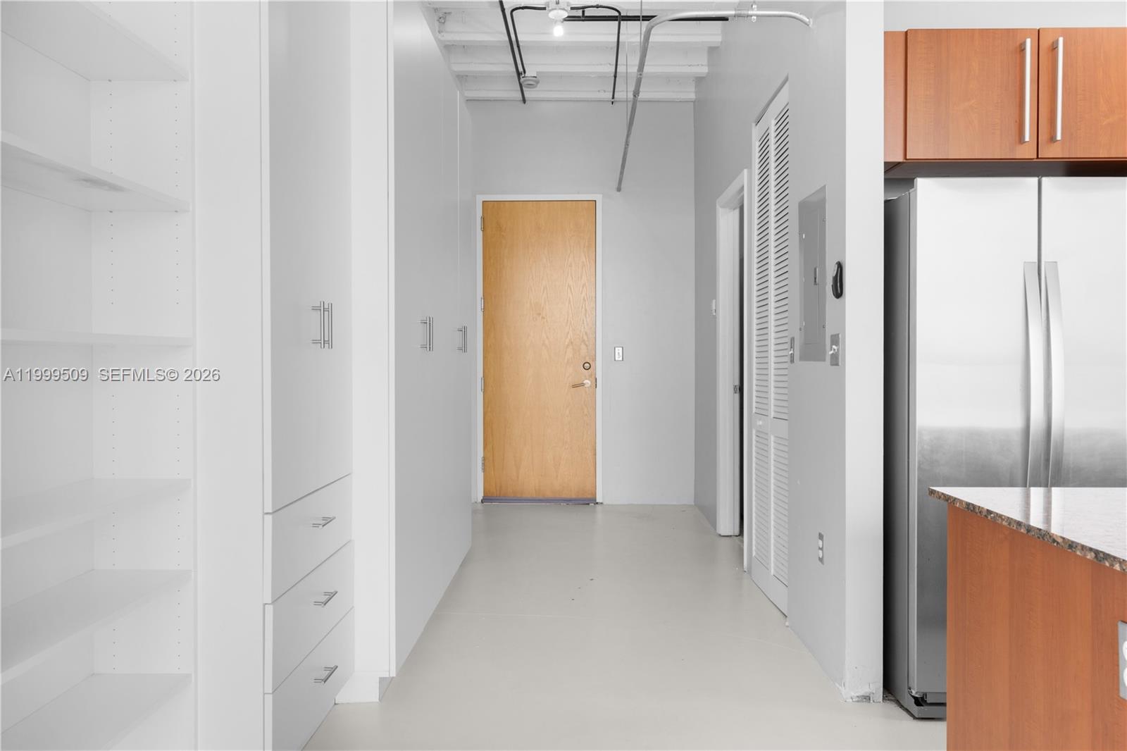 8101 Biscayne Boulevard, Unit R414 Miami, FL 33138 - Photo 14 of 27 a view of a hallway with closet