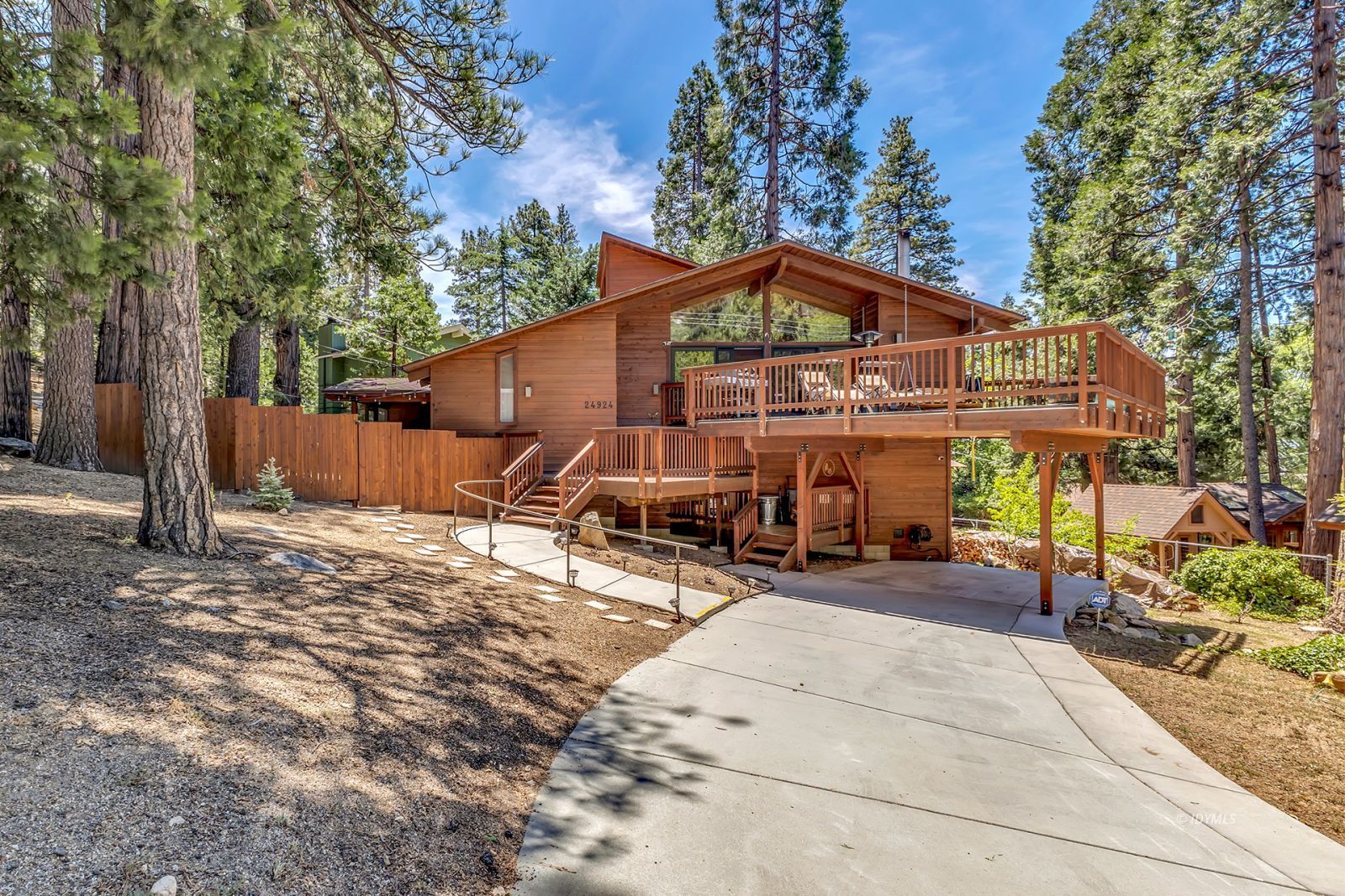 24924 Fern Valley Road Idyllwild, CA 92549 - Photo 9 of 72 a view of a house with a yard patio and sitting area