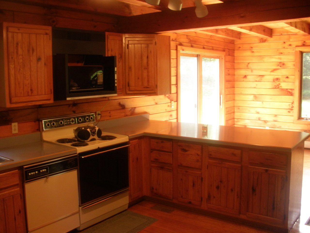 159 Central Shaft Road Florida, MA 01247 - Photo 2 of 16 a kitchen with stainless steel appliances granite countertop a stove a sink and a microwave