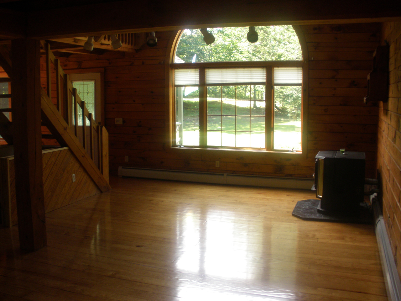 159 Central Shaft Road Florida, MA 01247 - Photo 4 of 16 a view of a livingroom with wooden floor and a window