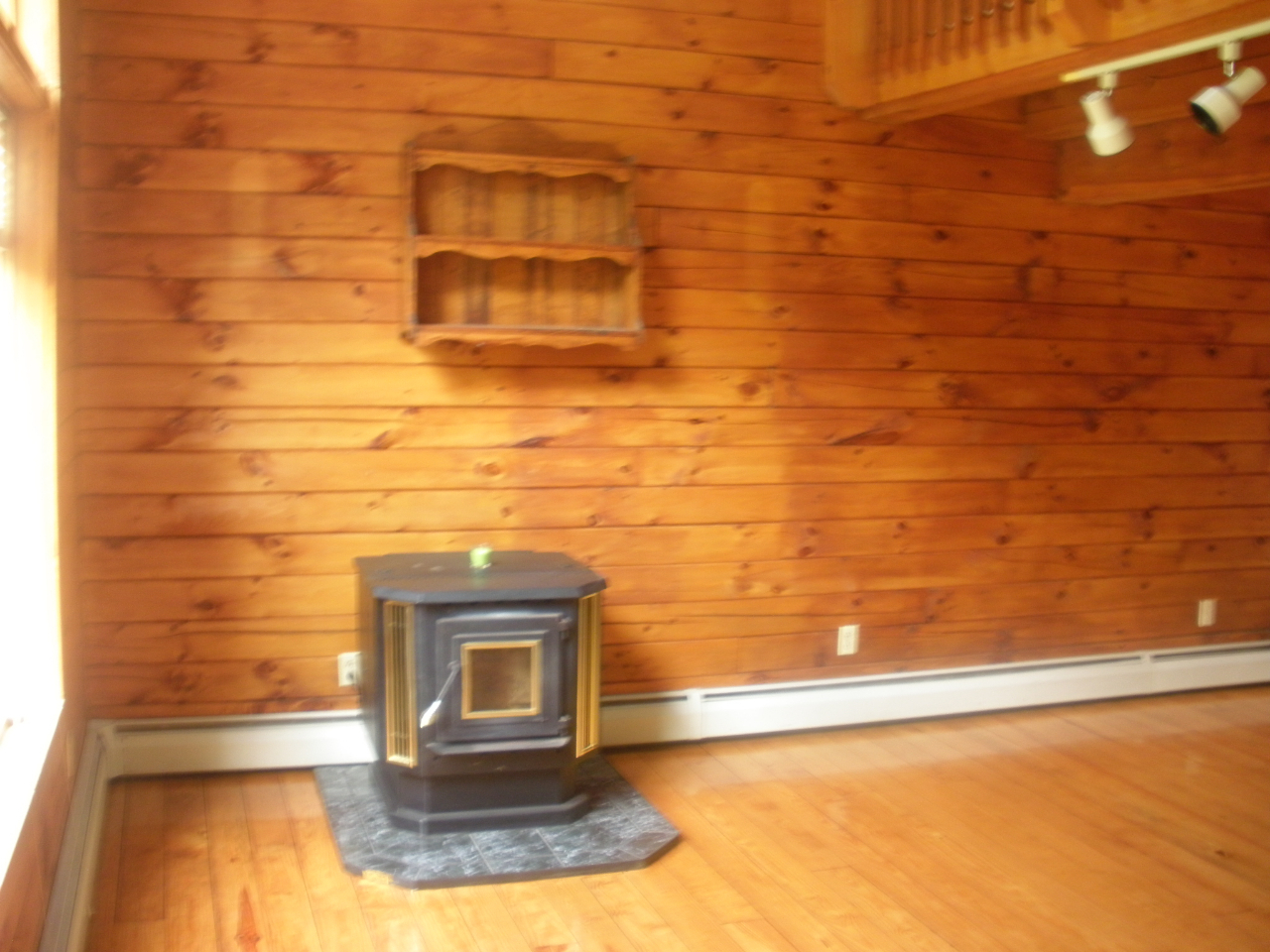 159 Central Shaft Road Florida, MA 01247 - Photo 5 of 16 a view of a fireplace with an empty space