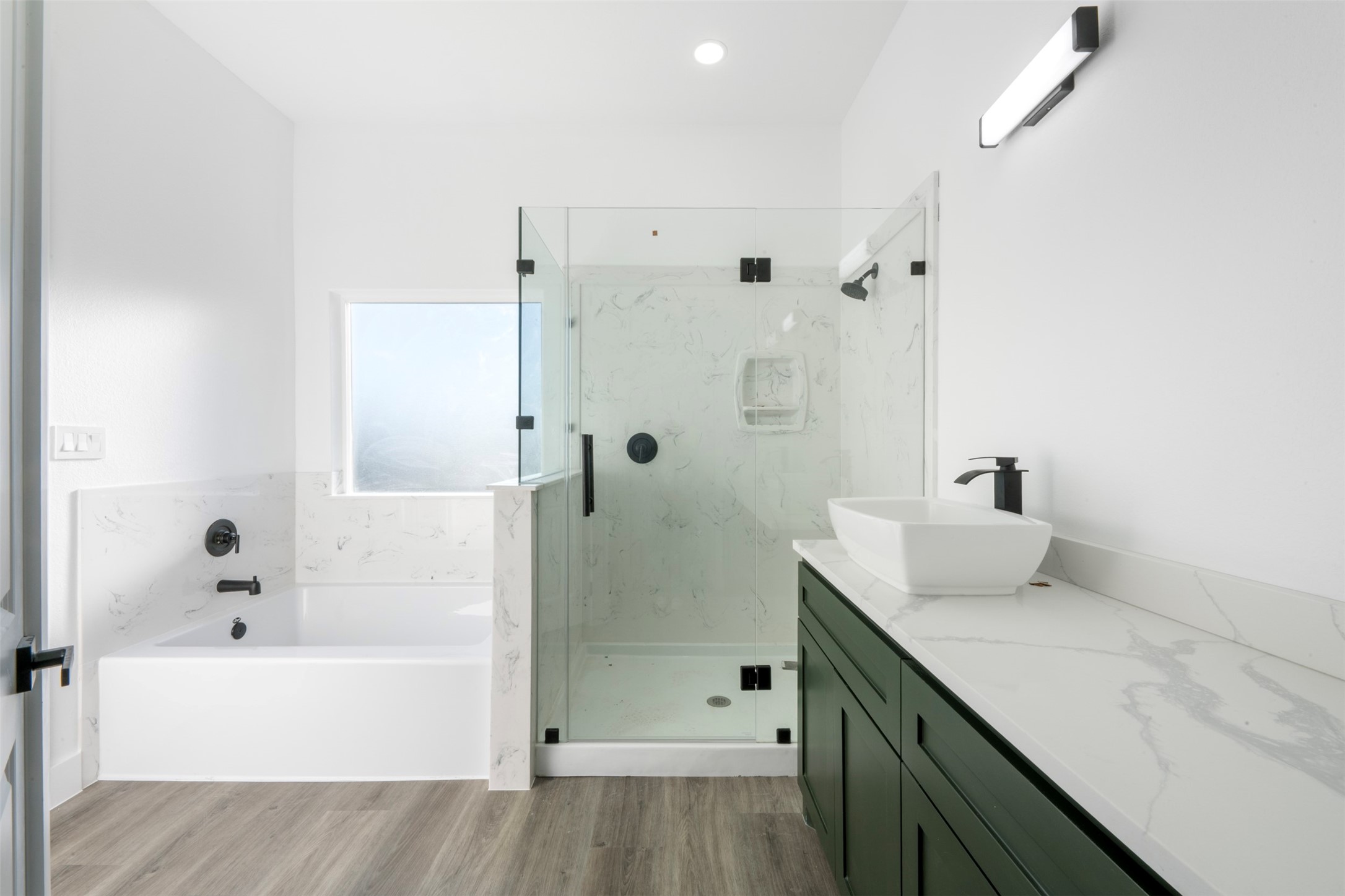 1306 Duff Lane Houston, TX 77022 - Photo 20 of 33 a bathroom with a bathtub shower sink and toilet