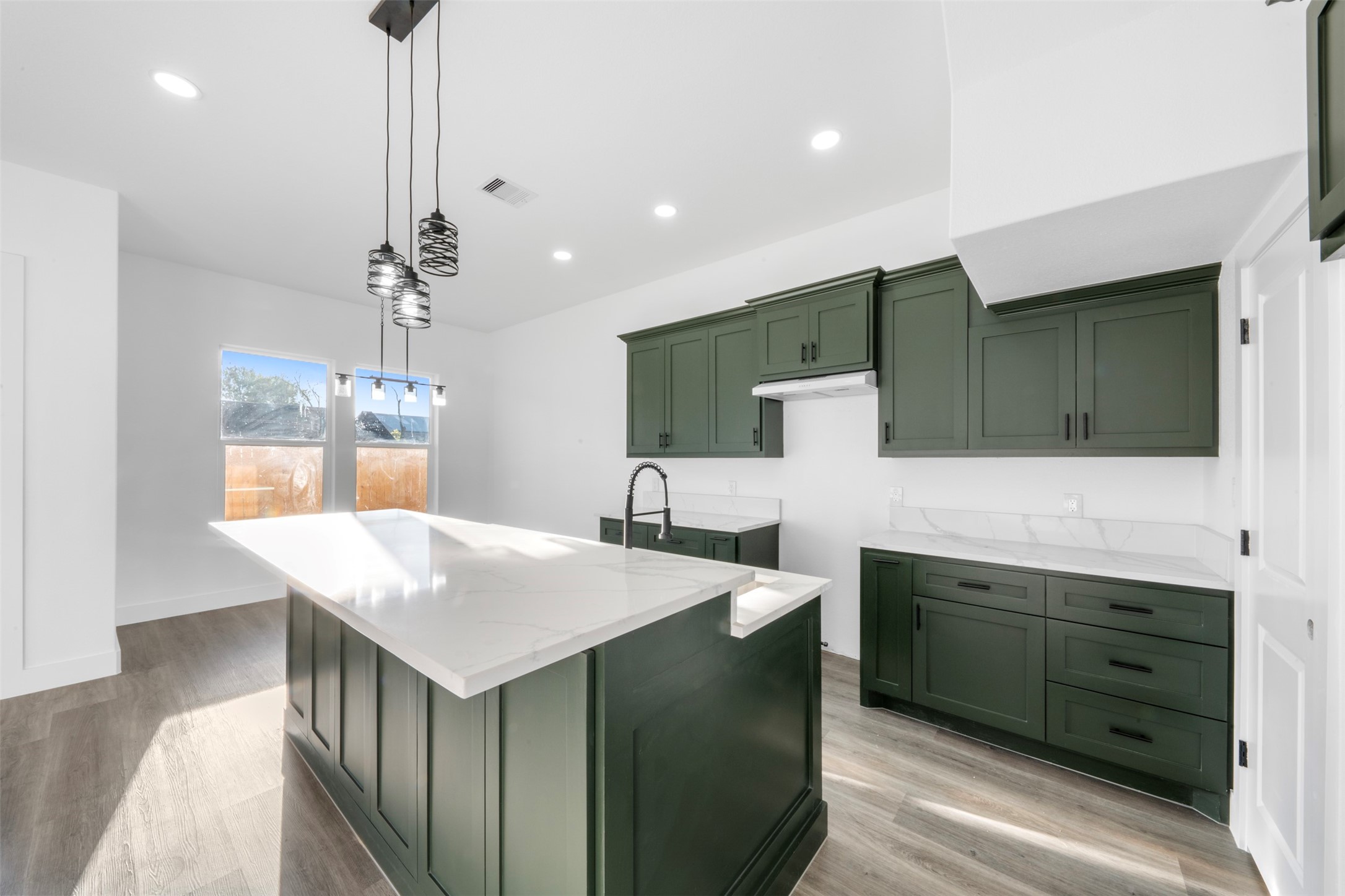 1306 Duff Lane Houston, TX 77022 - Photo 10 of 33 a kitchen with a sink and cabinets