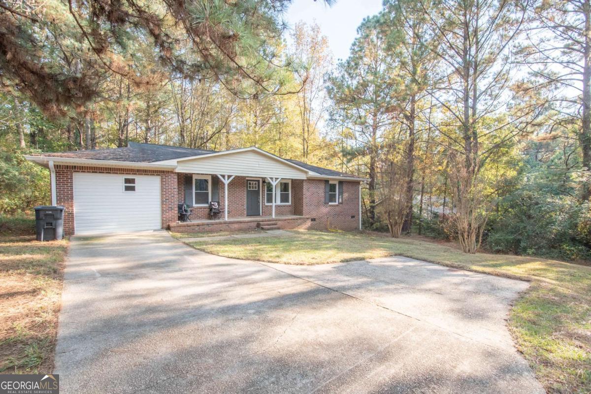 1104 Alverson Road LaGrange, GA 30241 - Photo 2 of 25 a front view of a house with a yard