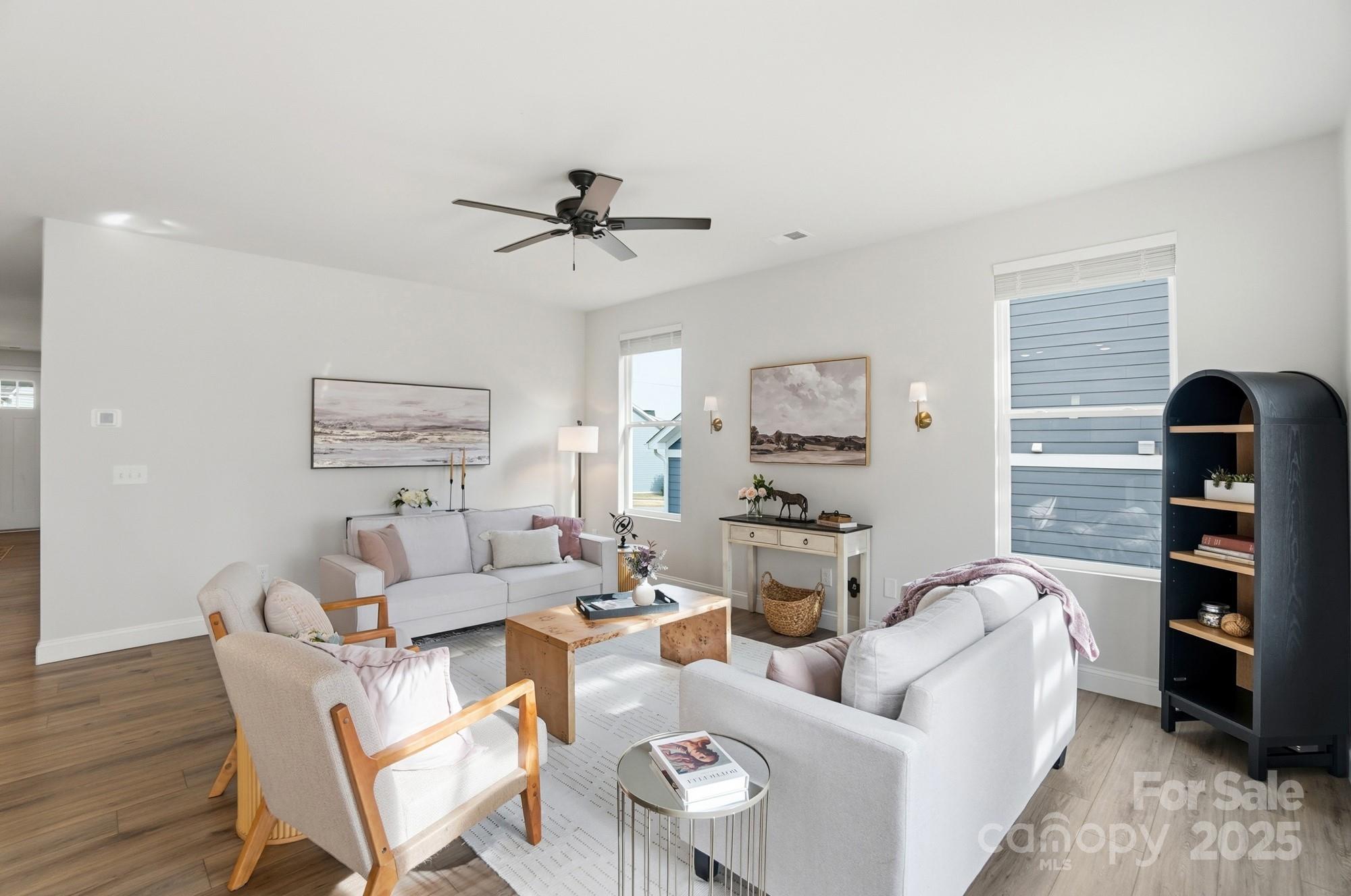 256 Hamrick Road, Unit 12 Cramerton, NC 28056 - Photo 15 of 41 a living room with furniture a ceiling fan and a window