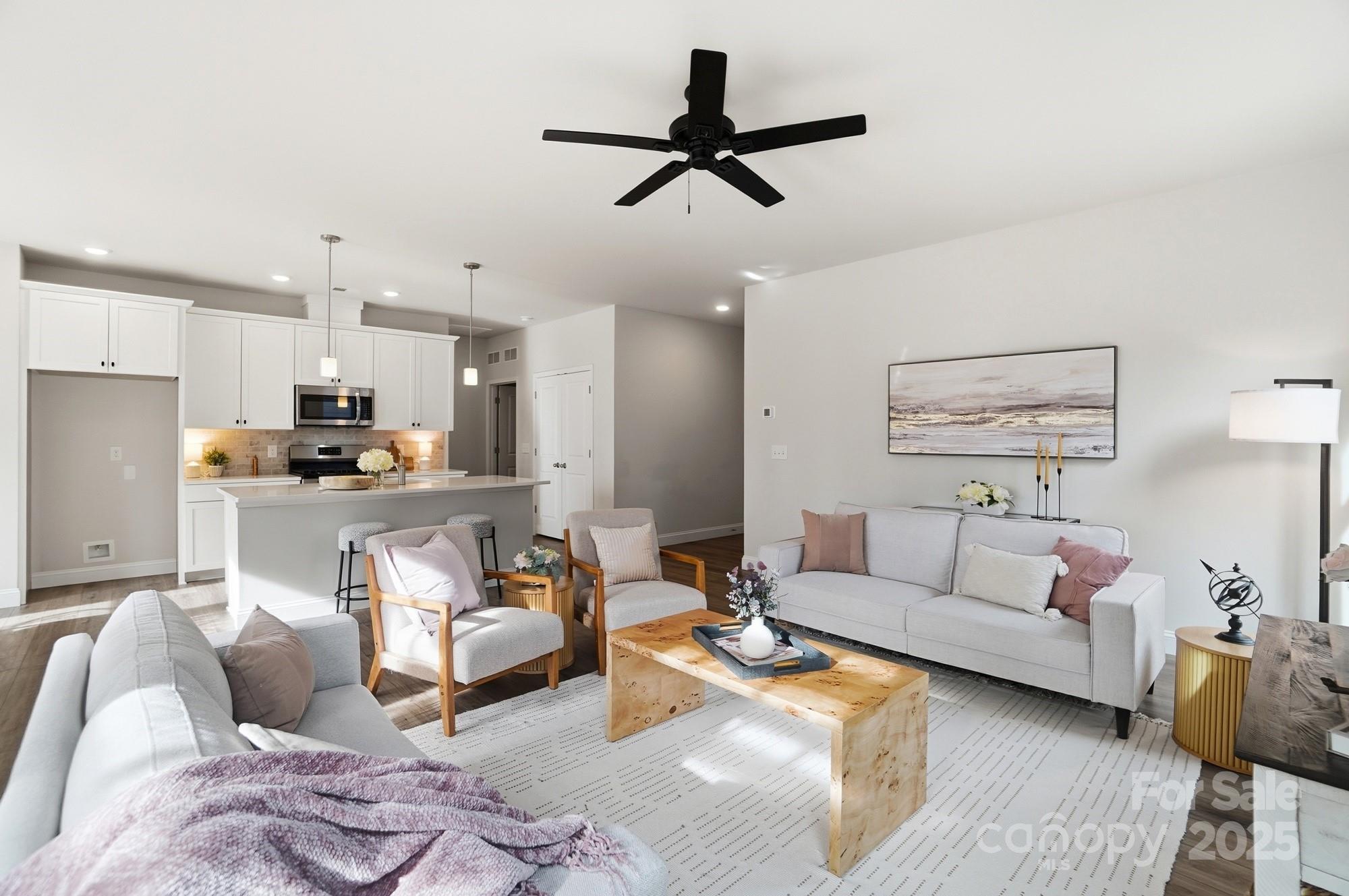 256 Hamrick Road, Unit 12 Cramerton, NC 28056 - Photo 16 of 41 a living room with furniture and kitchen view