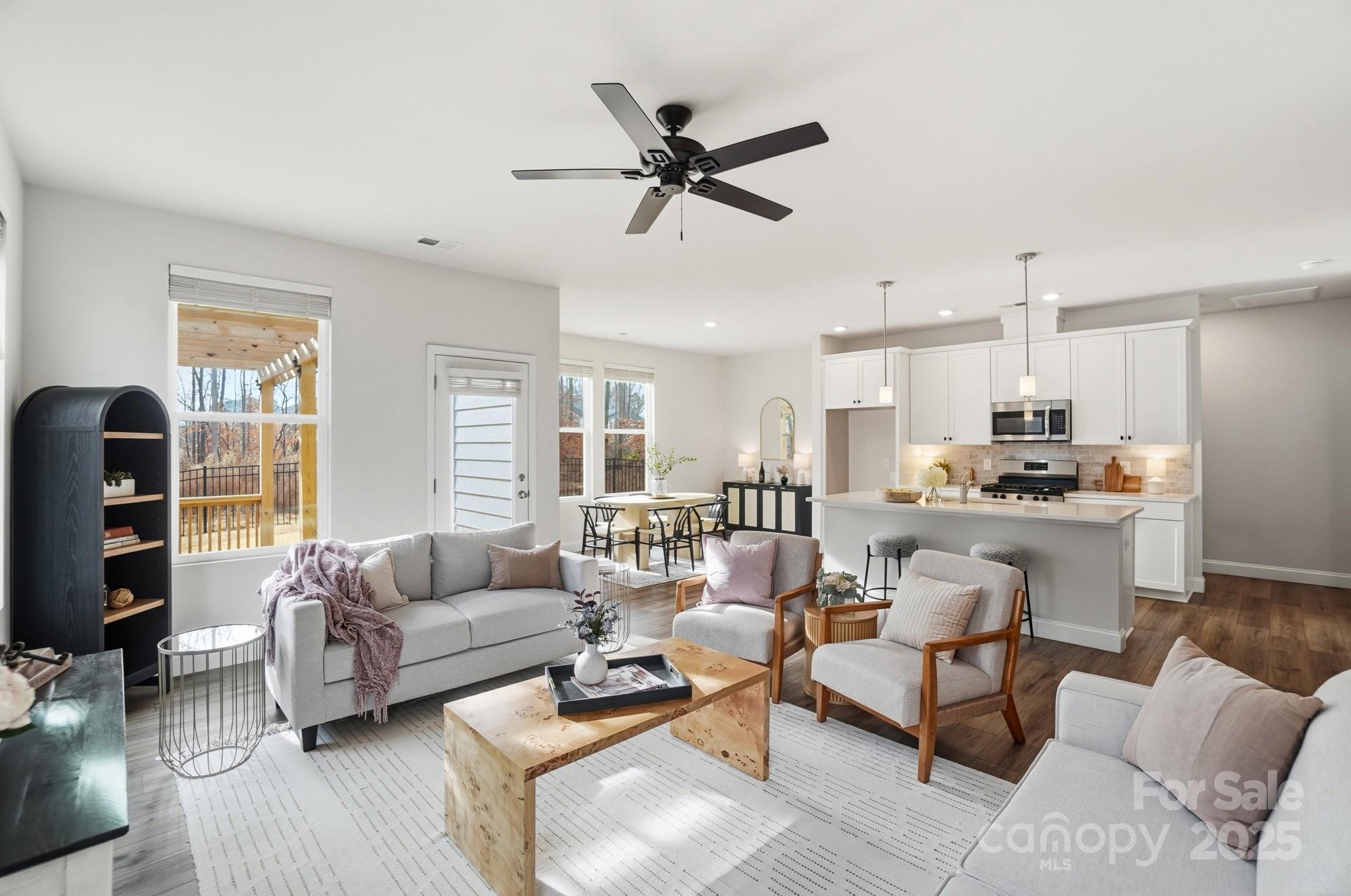 256 Hamrick Road, Unit 12 Cramerton, NC 28056 - Photo 17 of 41 a living room with furniture kitchen view and a window