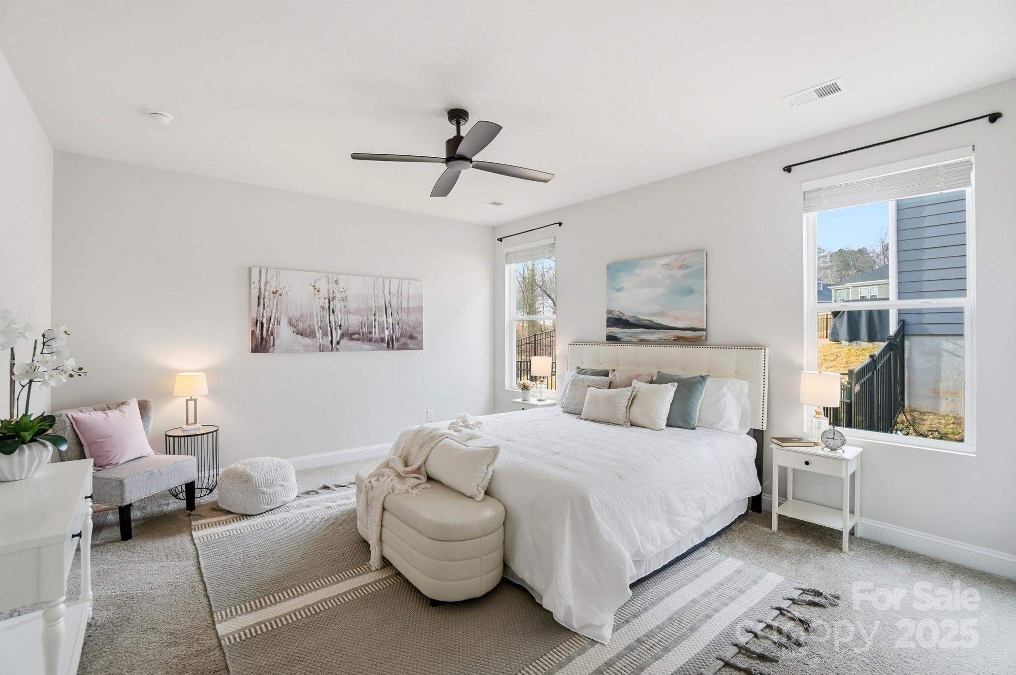 256 Hamrick Road, Unit 12 Cramerton, NC 28056 - Photo 23 of 41 a bedroom with a bed couch and window