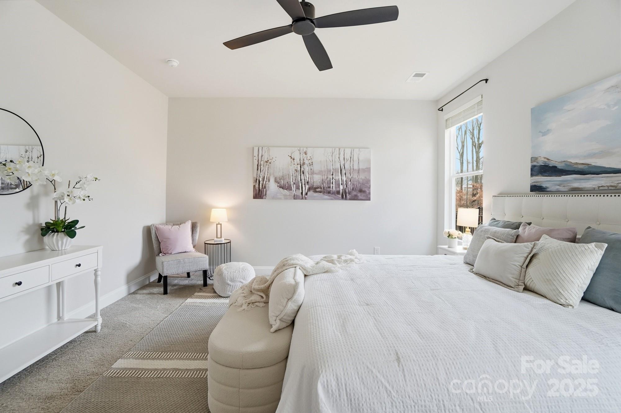 256 Hamrick Road, Unit 12 Cramerton, NC 28056 - Photo 24 of 41 a bedroom with a large bed and furniture