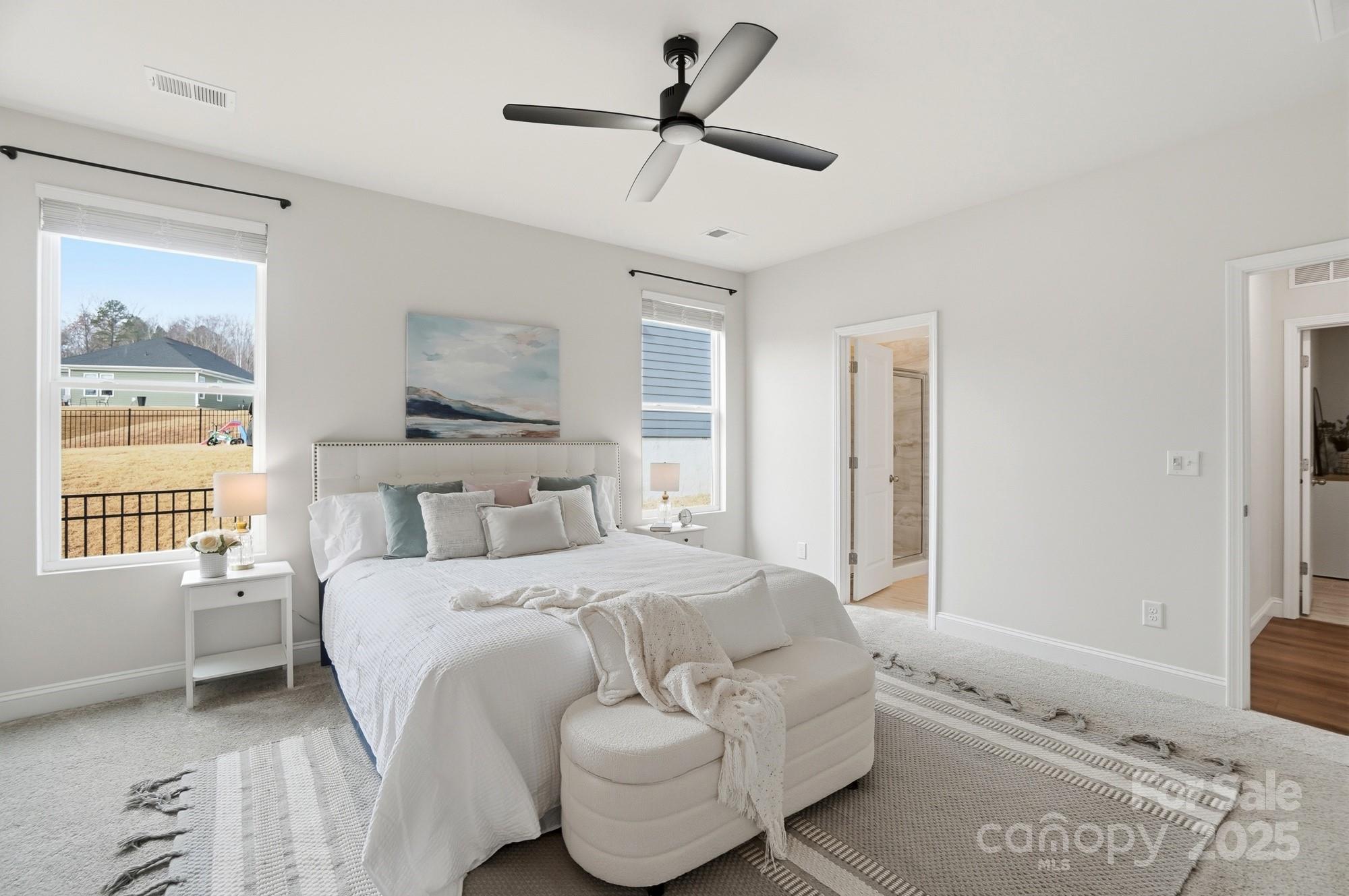 256 Hamrick Road, Unit 12 Cramerton, NC 28056 - Photo 26 of 41 a bedroom with a bed and a window