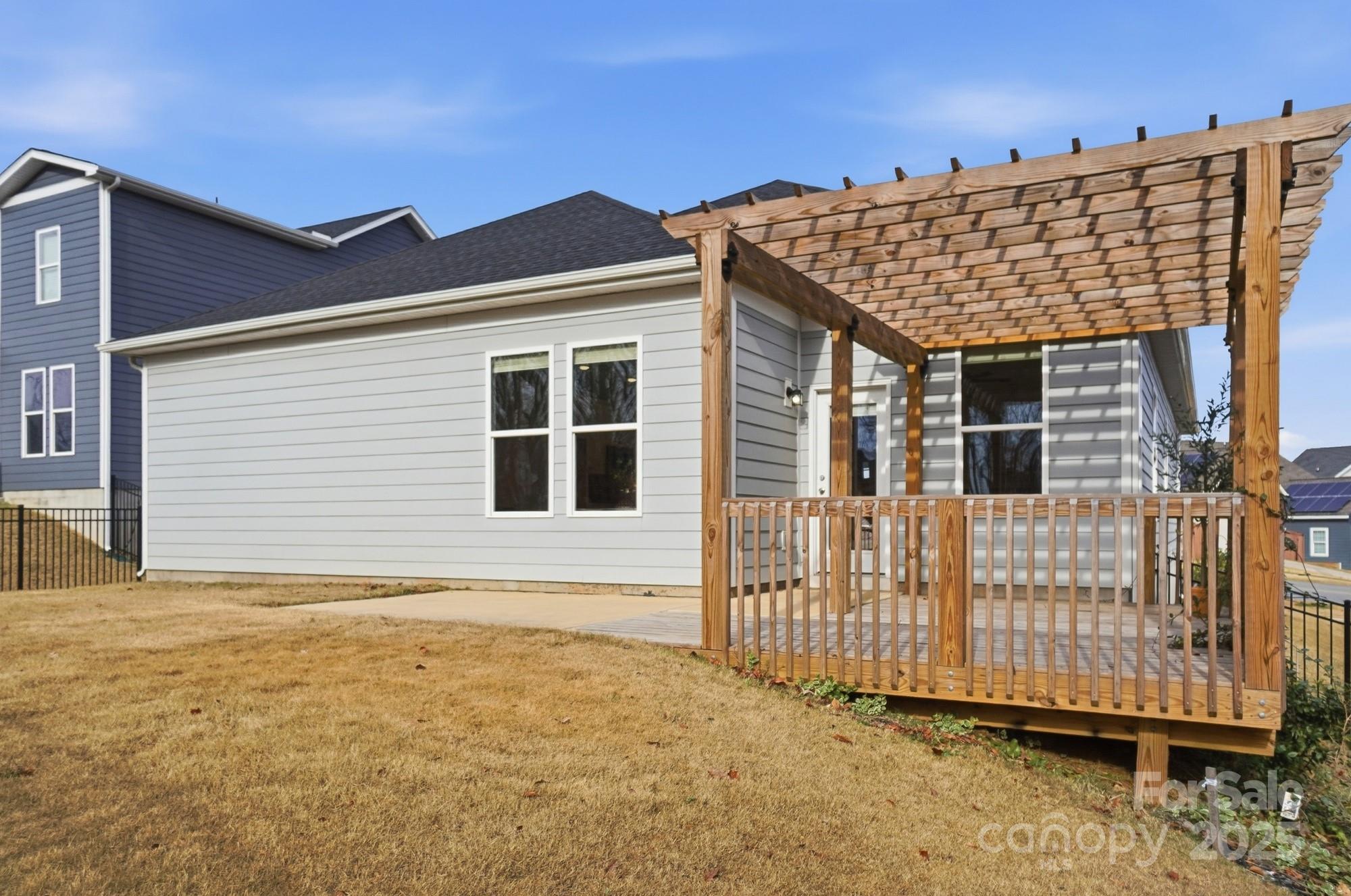 256 Hamrick Road, Unit 12 Cramerton, NC 28056 - Photo 40 of 41 a front view of a house with a yard
