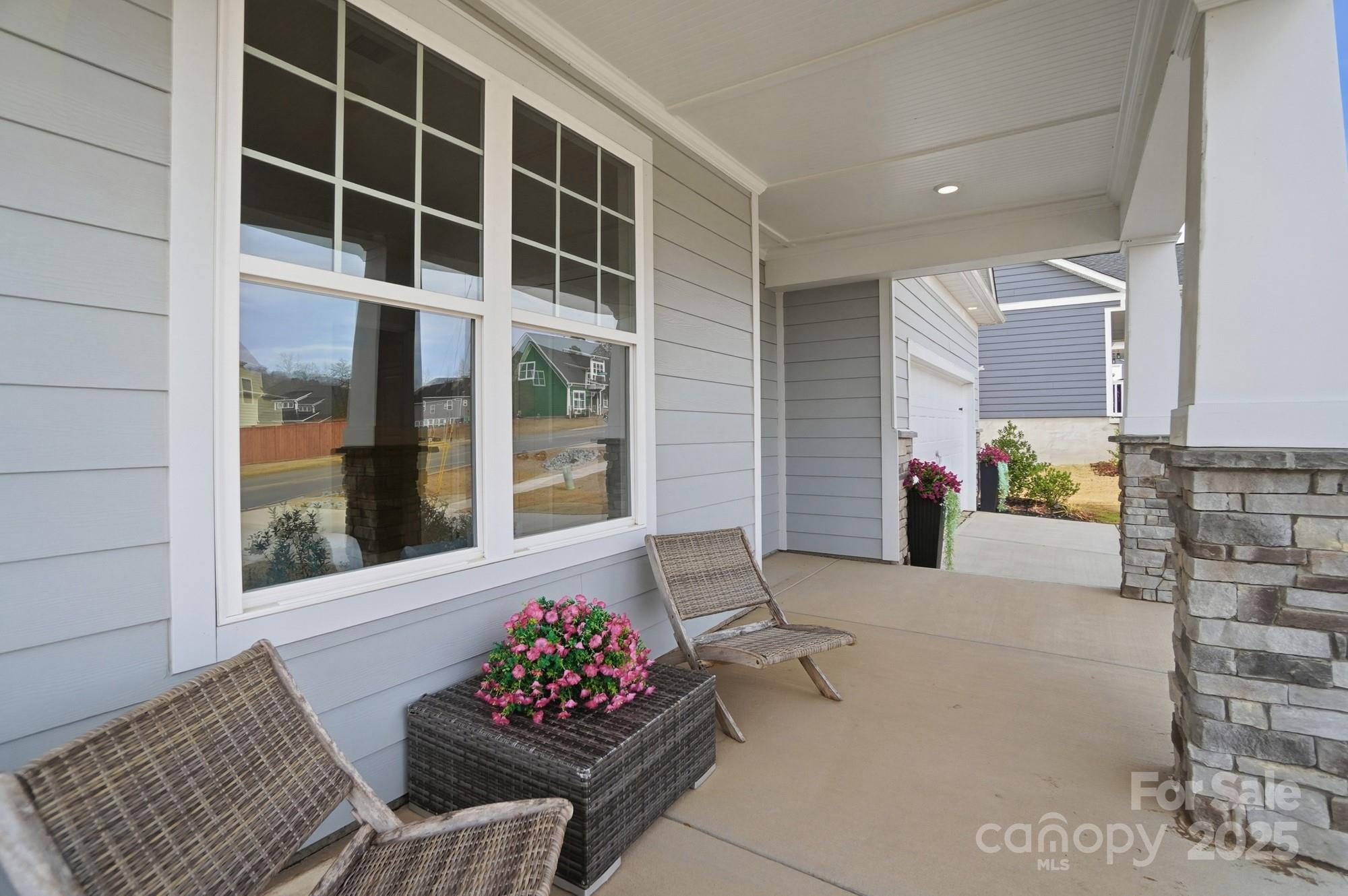 256 Hamrick Road, Unit 12 Cramerton, NC 28056 - Photo 6 of 41 a living room with furniture and a potted plant