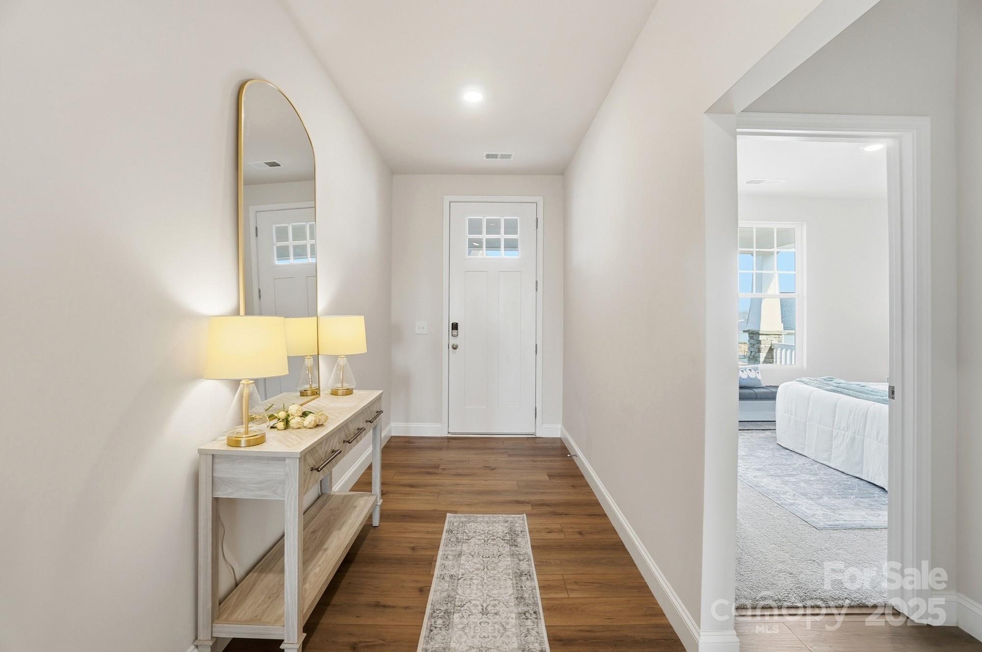 256 Hamrick Road, Unit 12 Cramerton, NC 28056 - Photo 7 of 41 a bathroom with a sink a mirror and a shower
