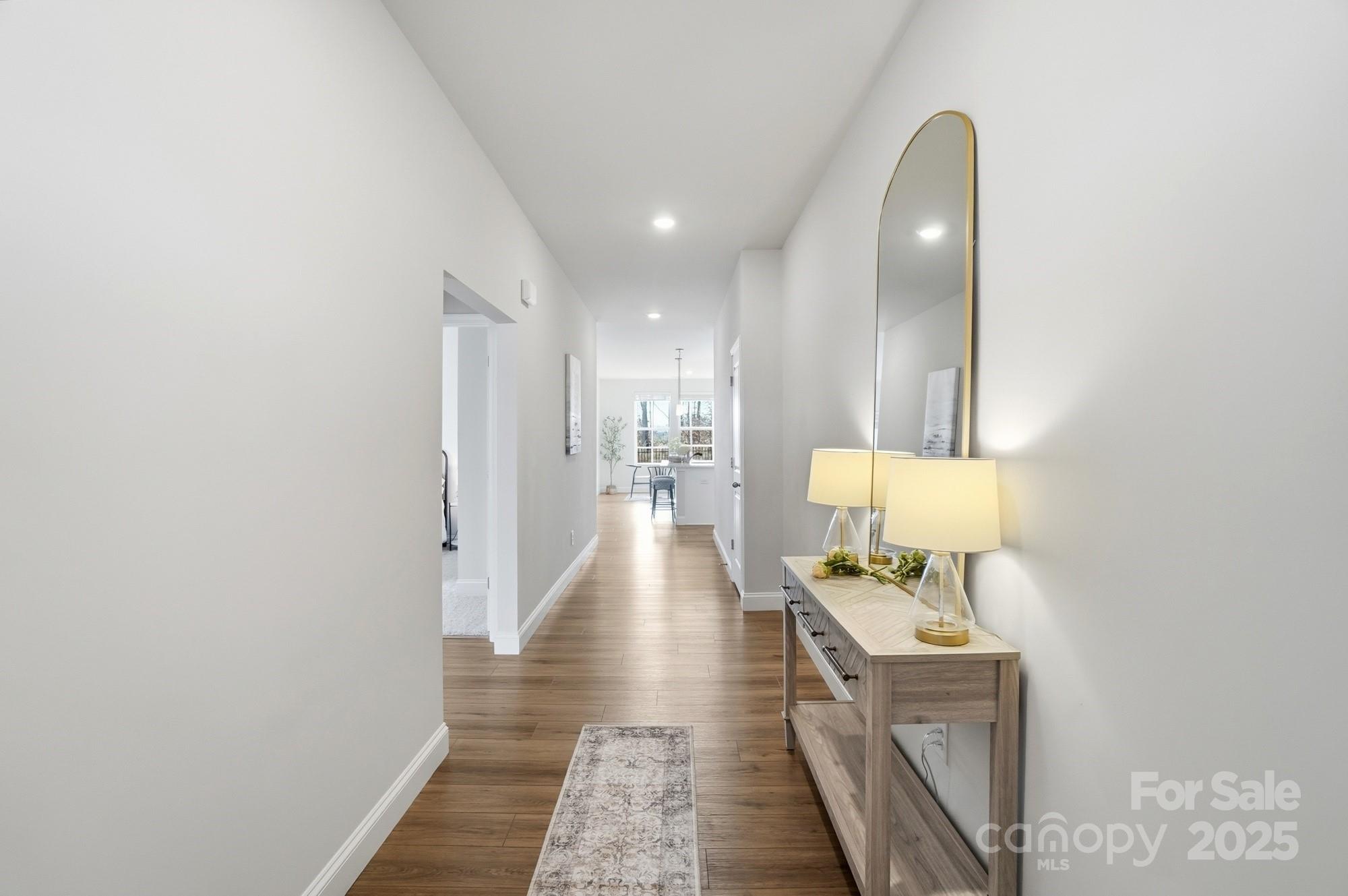 256 Hamrick Road, Unit 12 Cramerton, NC 28056 - Photo 8 of 41 a view of a hallway with wooden floor