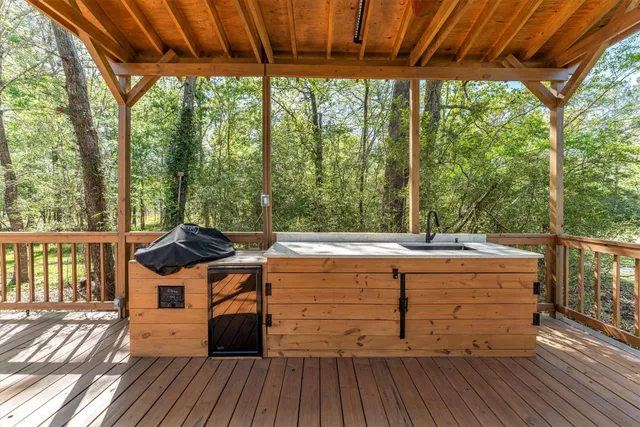 a view of a two chairs in the balcony