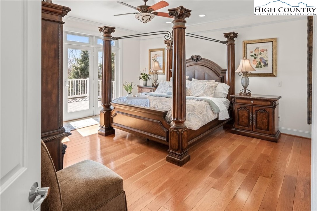 368 Fox Run Lane Sparta, NC 28675 - Photo 13 of 50 a spacious bedroom with a bed window and a table