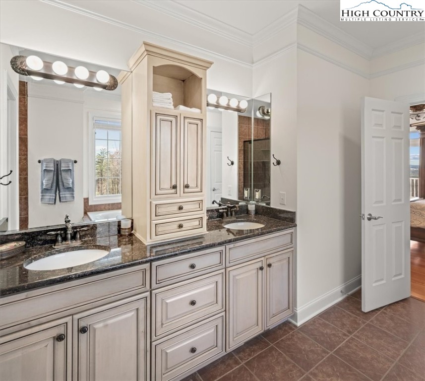 368 Fox Run Lane Sparta, NC 28675 - Photo 15 of 50 a bathroom with double sink and a mirror